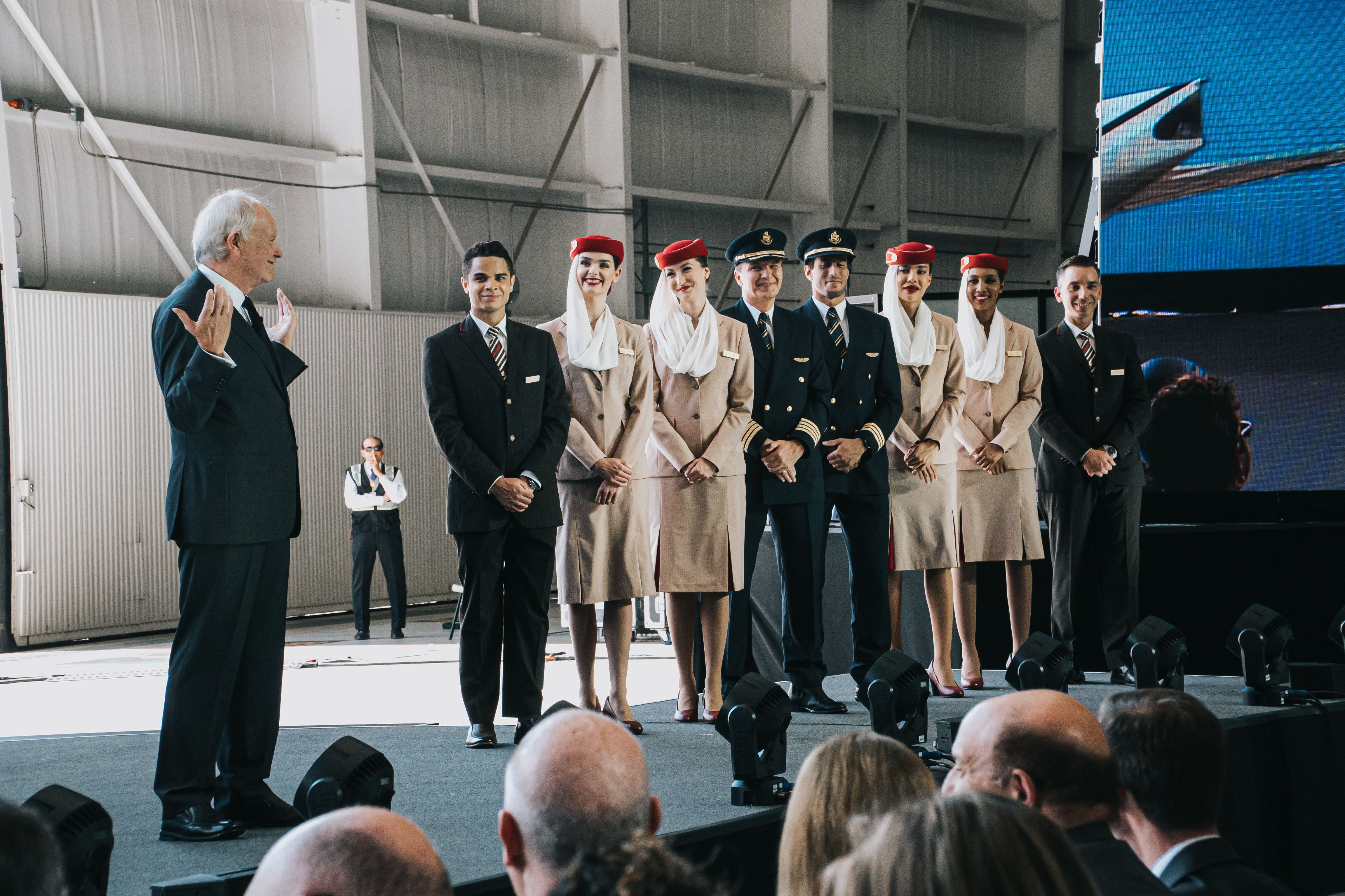 Emirates crew onstage with Sir Tim Clark