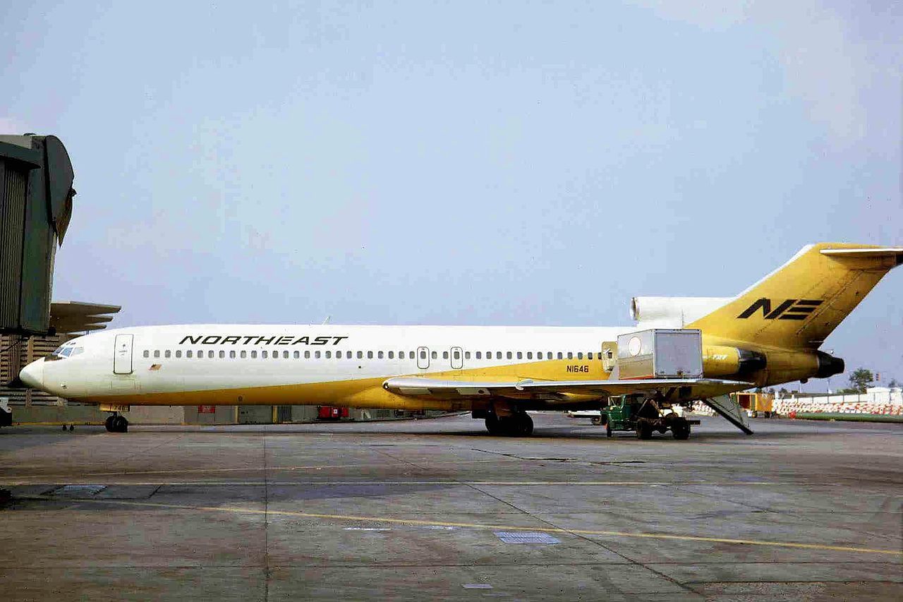 A Northeast Airlines Boeing 727 on an airport apron.