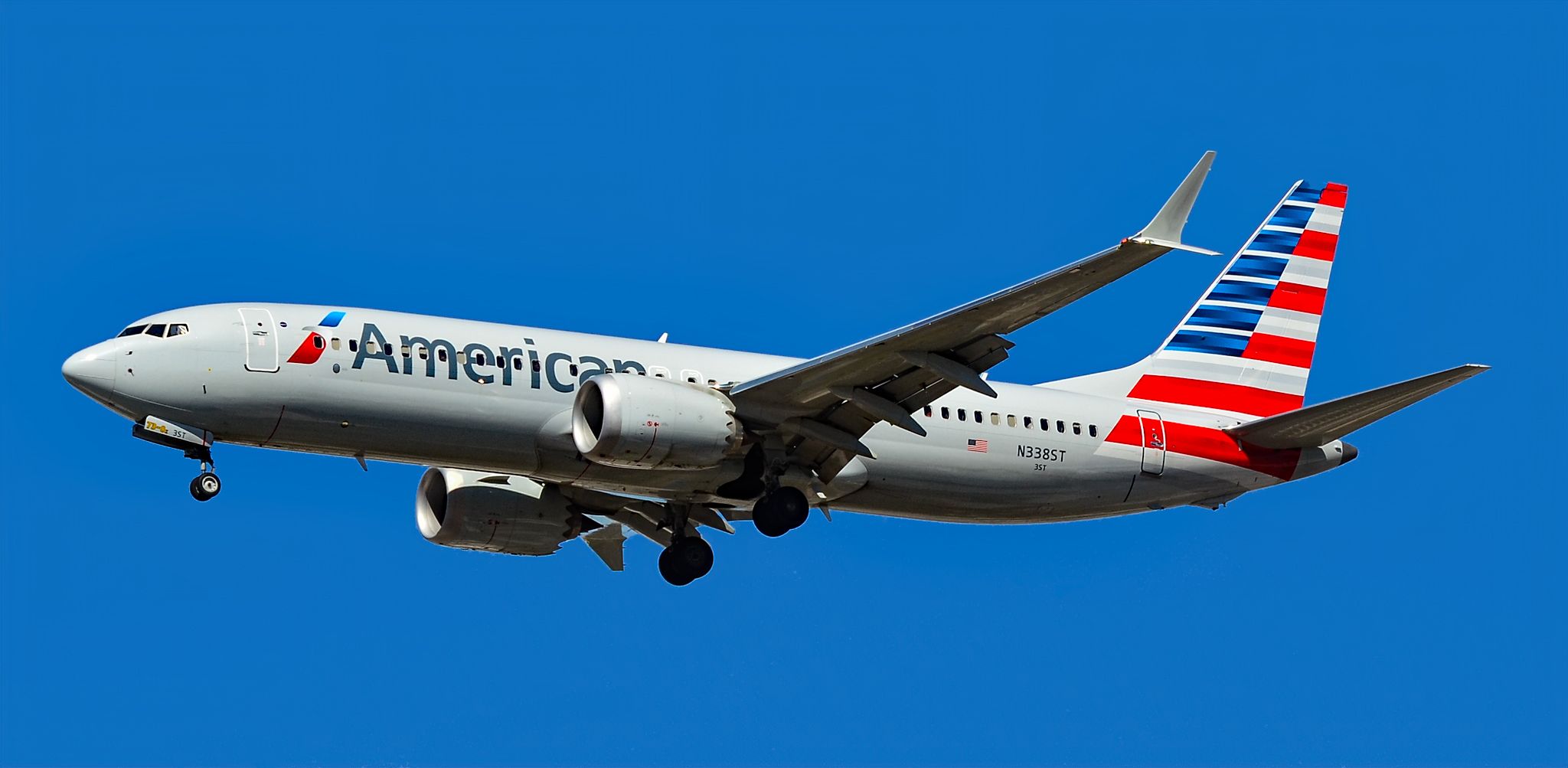 N338ST American Airlines Boeing 737 8 MAX s/n 44484 landing in blue sky