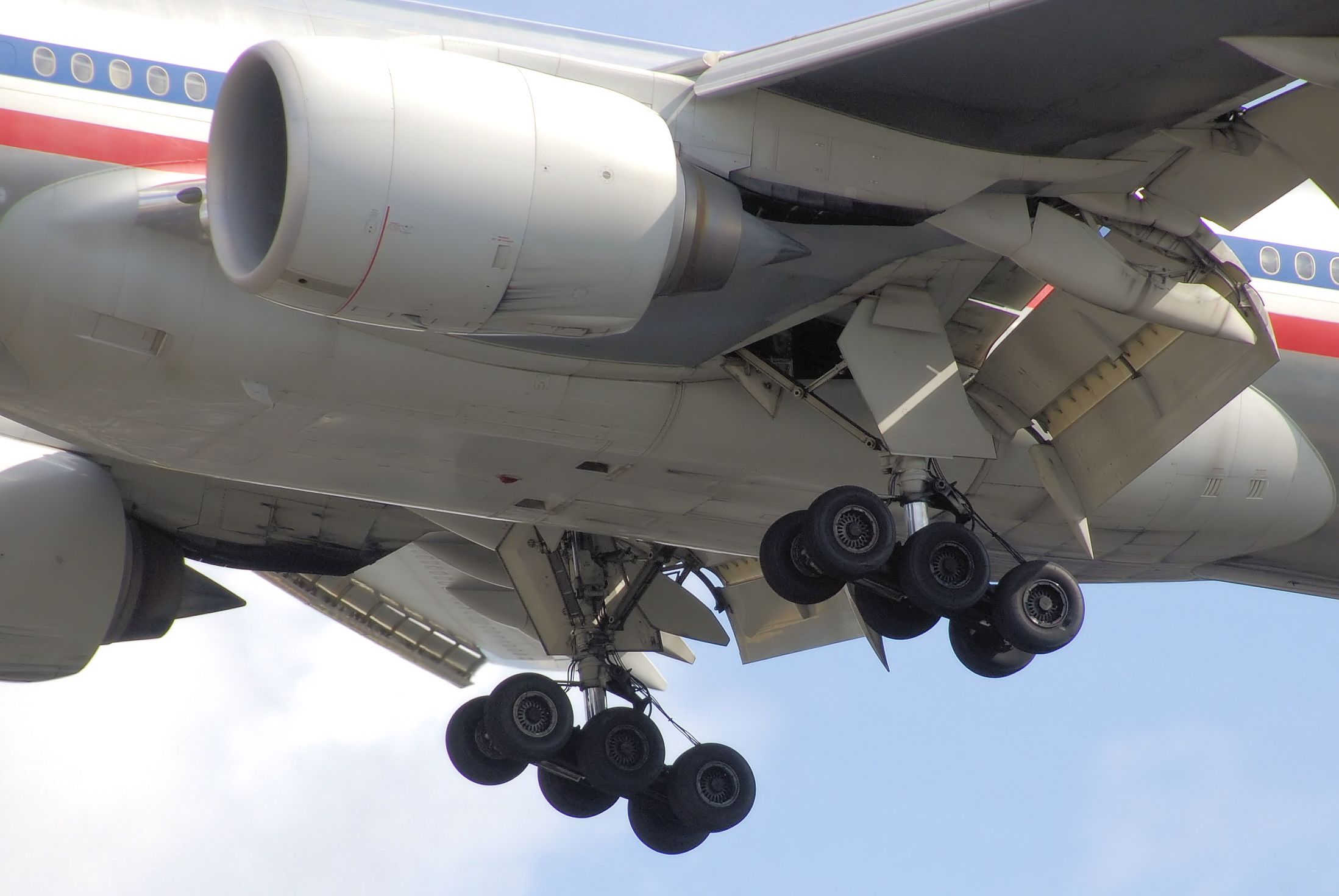 An American Airlines Boeing 777-200ER landing gear and flaps