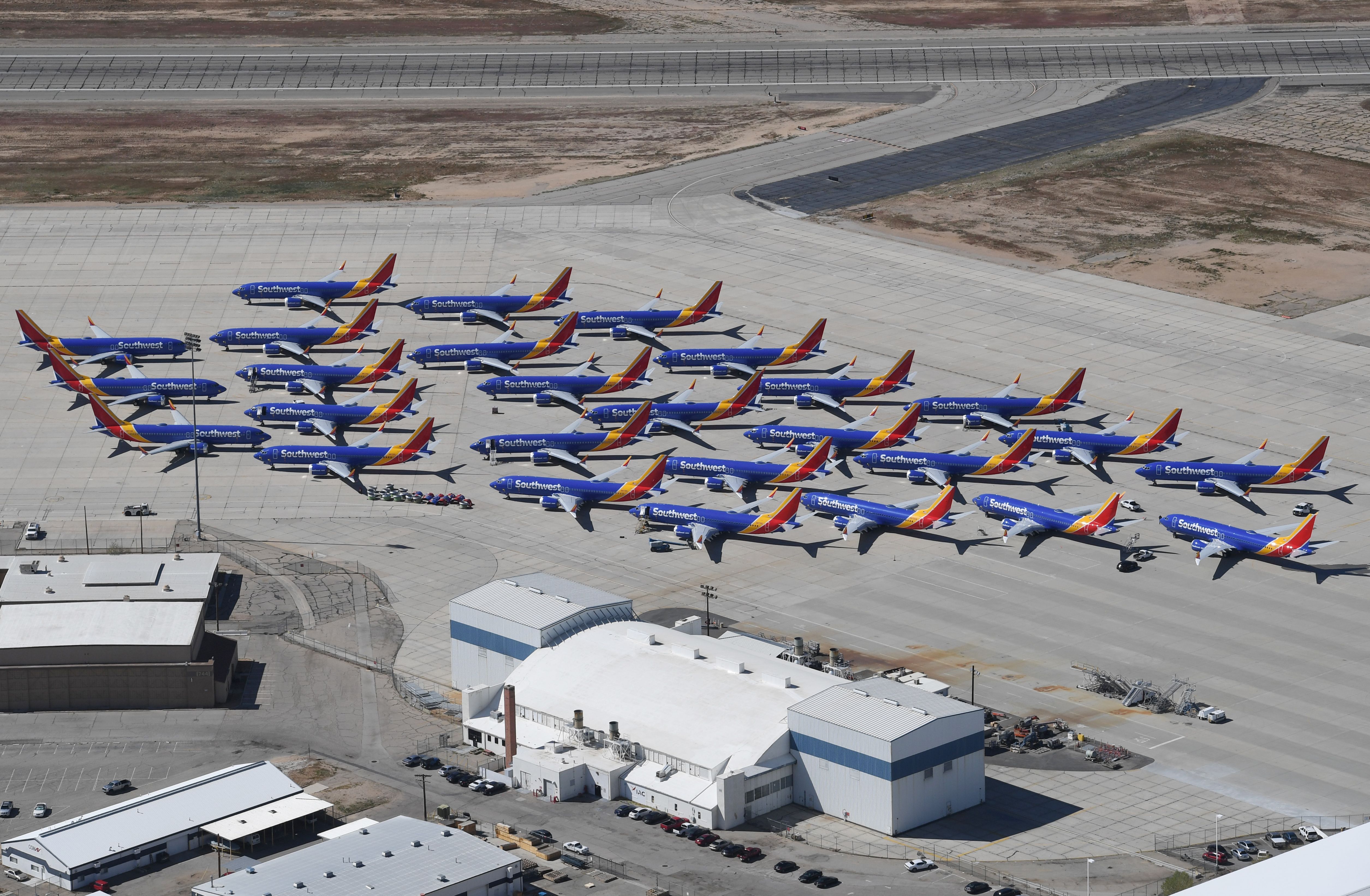 Southwest Airlines Boeing 737 MAX aircraft are parked on the tarmac after being grounded, at the Southern California Logistics Airport in Victorville, California 