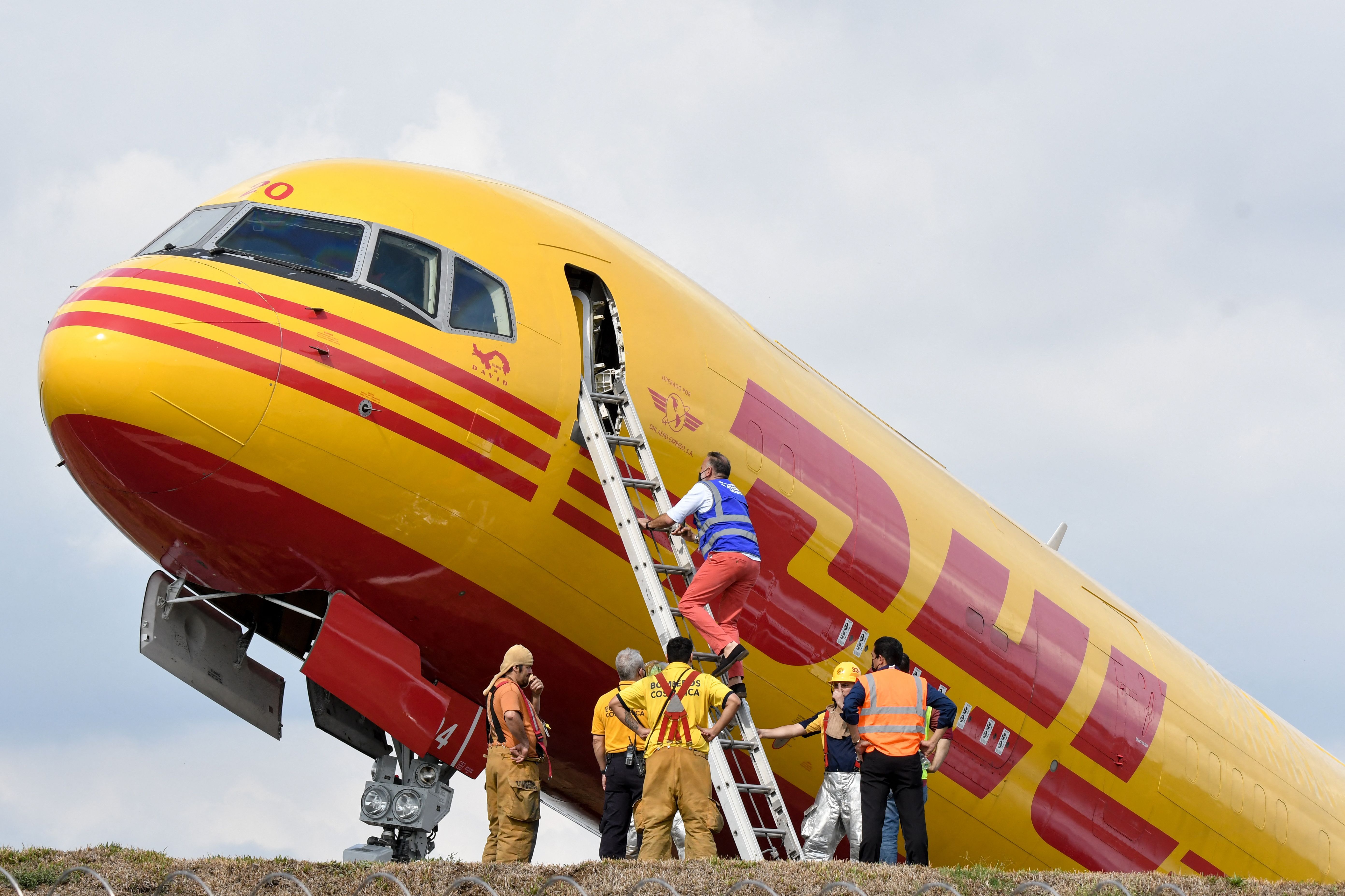A DHL cargo plane is seen after emergency landing at the Juan Santa Maria international airport due to a mechanical problem, in Alajuela, Costa Rica, on April 7, 2022.