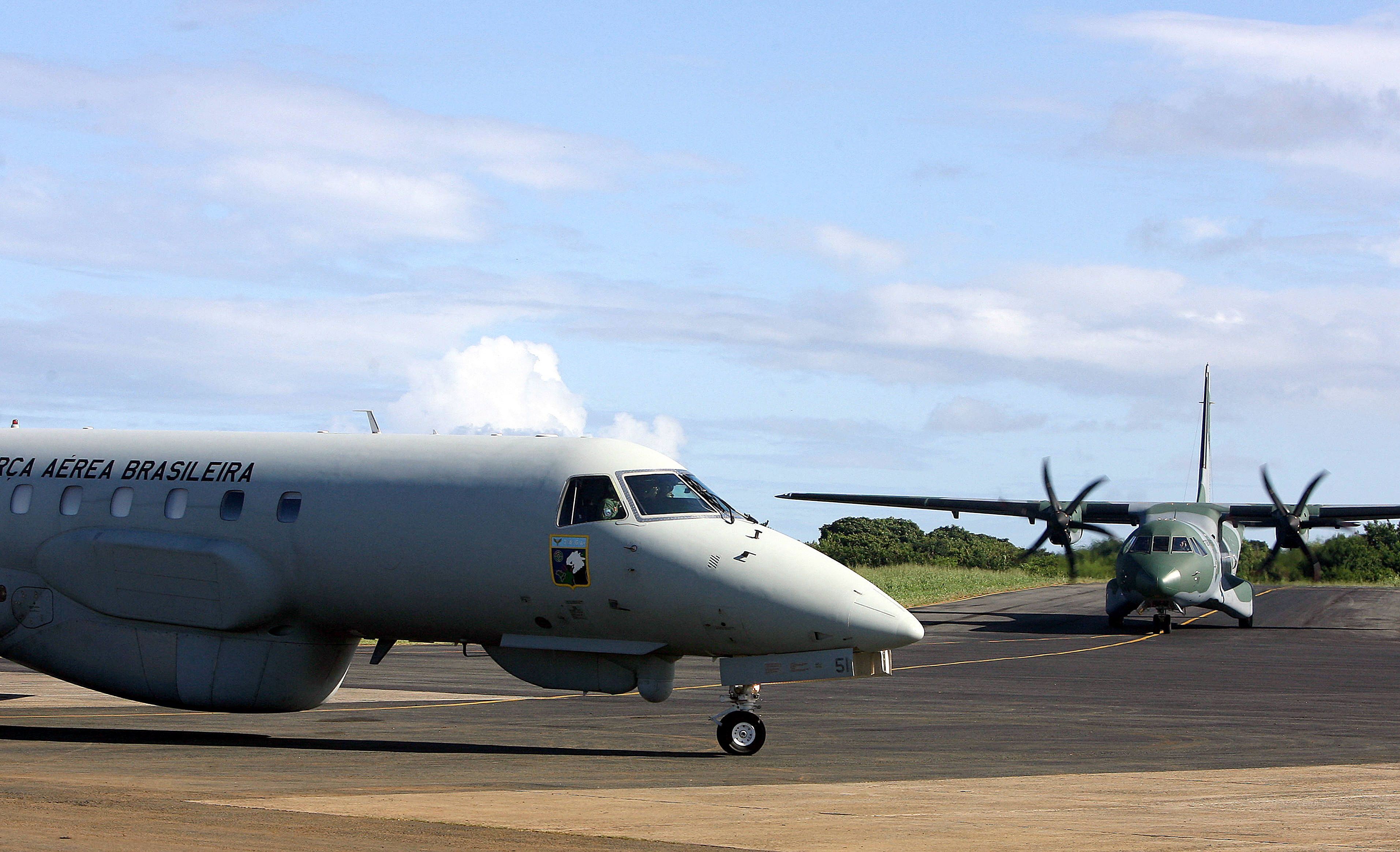 A Brazilian Air Force remote sensing R99 aircraft (L) and a C-105 aircraft prepare for take off at Fernando de Noronha Airport in 2009