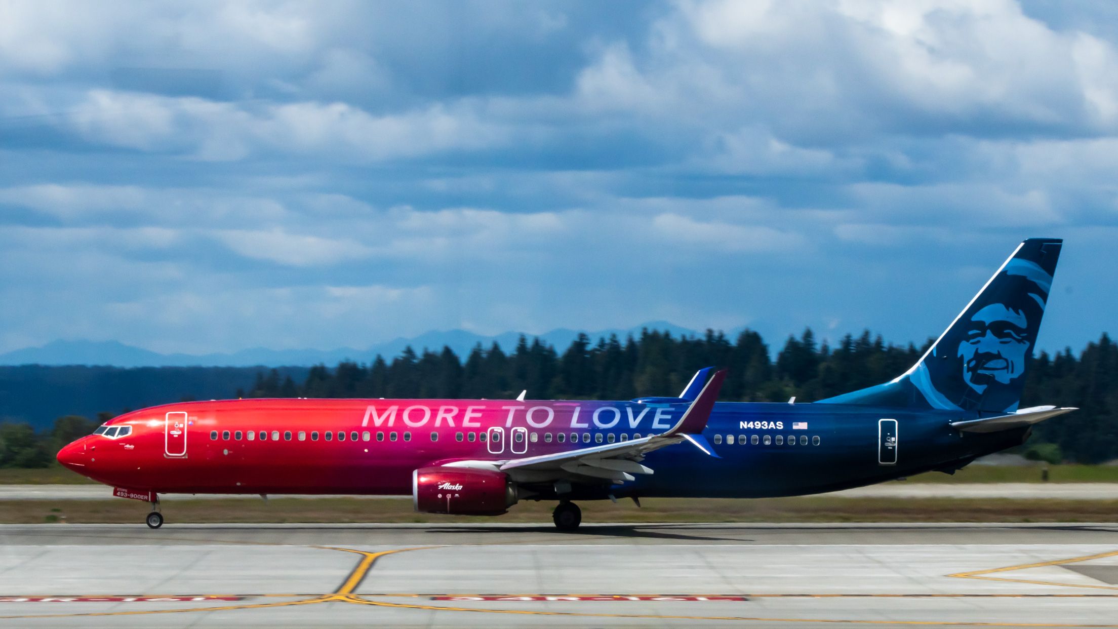 "More to Love" Heading Down the KSEA Runway - Alaska Airlines livery on a 737-900ER celebrating acquiring Virgin America