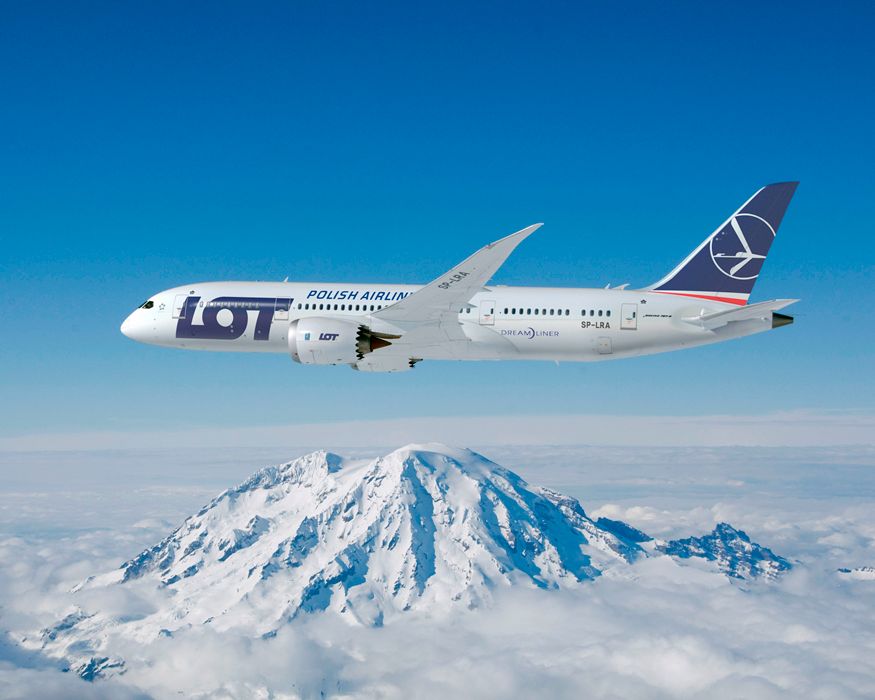 LOT Polish Airlines Boeing 787-9 Dreamliner In Flight over mountain