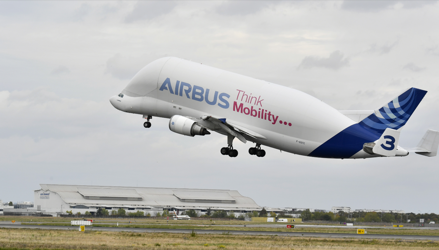 Airbus BelugaST taking off with satellite cargo
