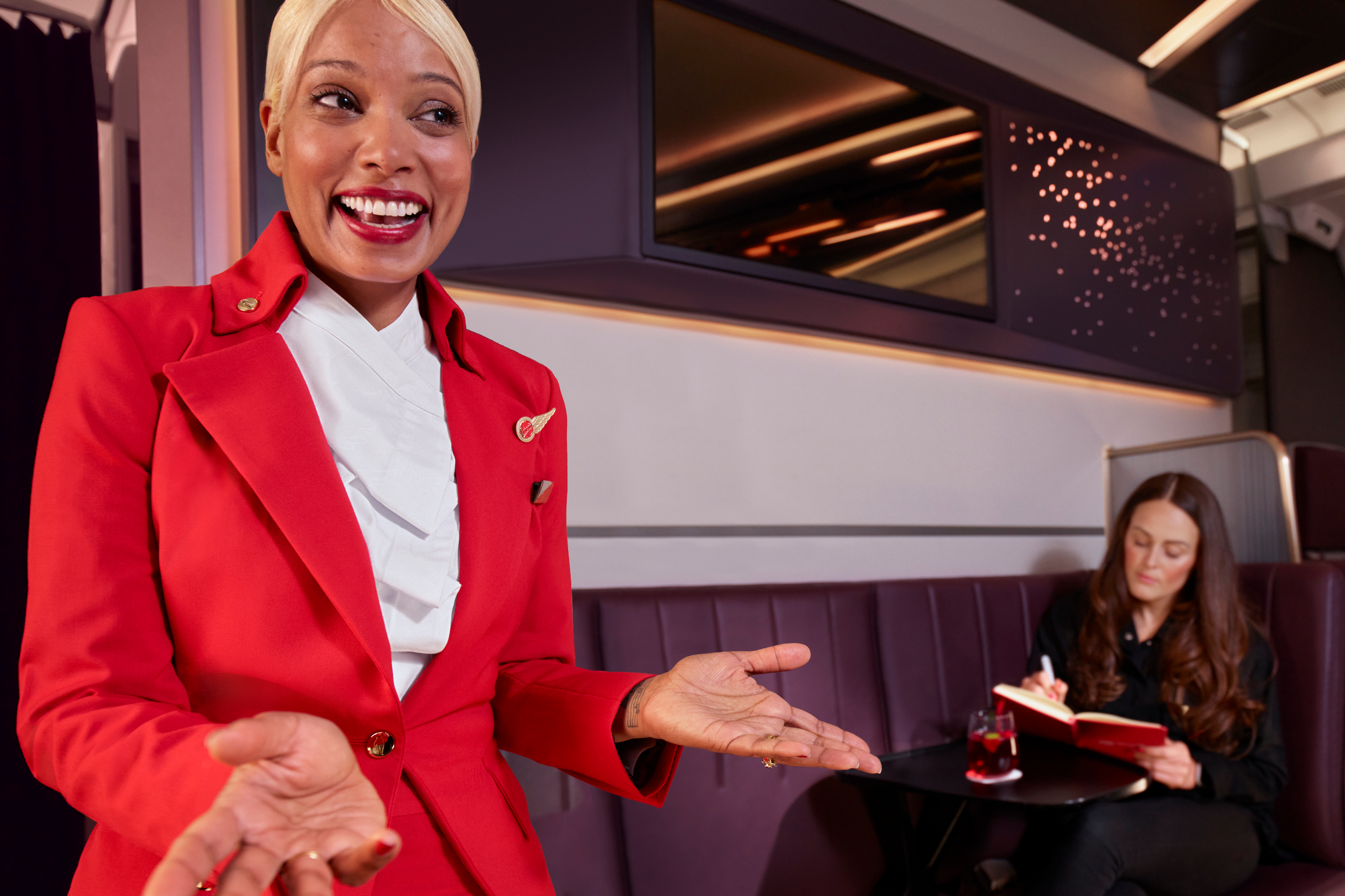 Smiling flight attendant of Virgin Atlantic