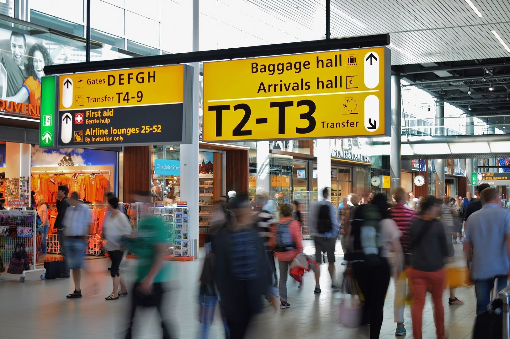 busy airport with people walking