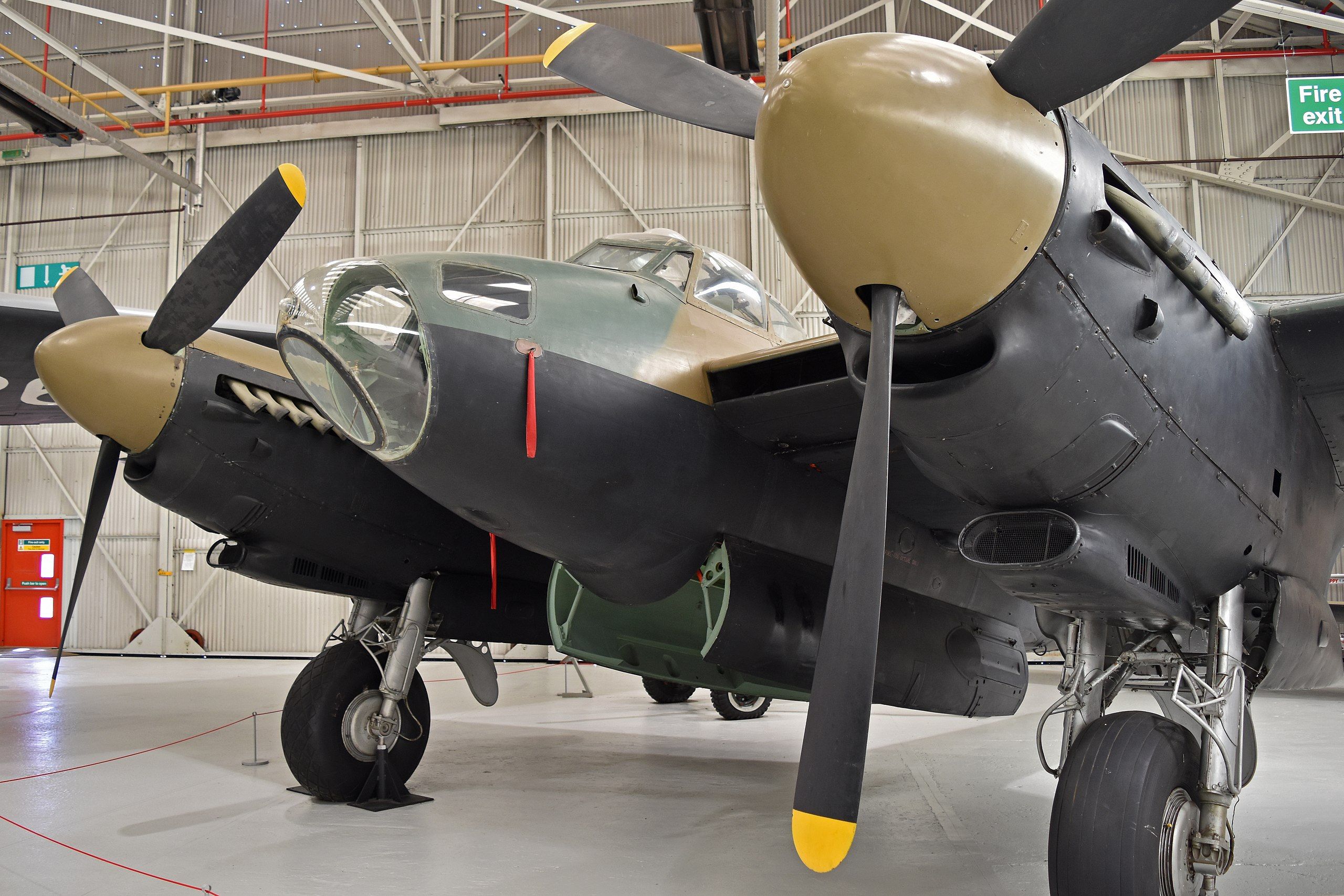 A De Havilland DH98 Mosquito sitting in a hangar.