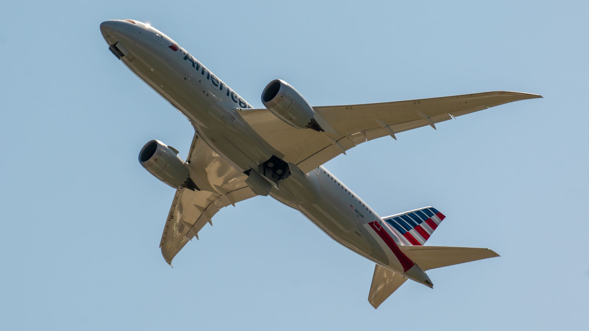 Rising American Airlines 787-8 Dreamliner Under Blue Skies