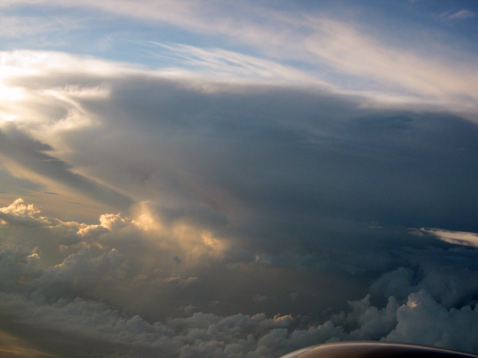 A thunderstorm, which would require circumnavigation, as seen from the air.