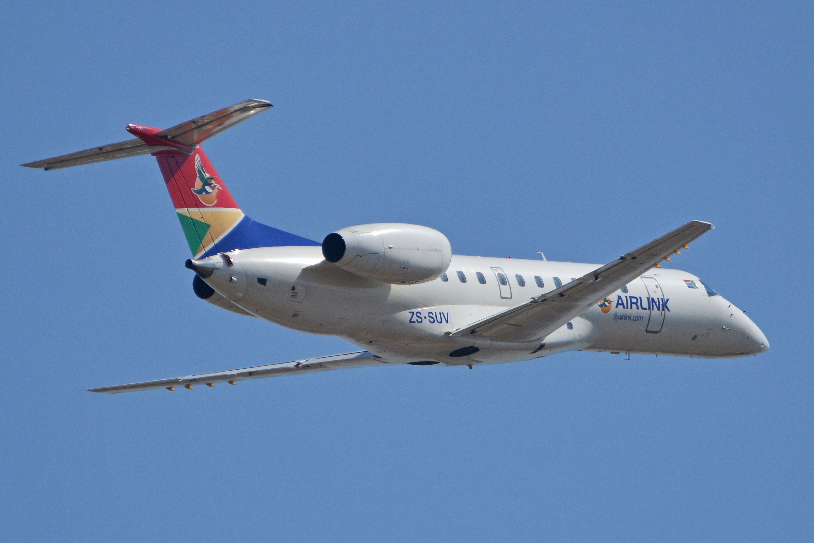 An Airlink Embraer ERJ-135 flying in the sky. 