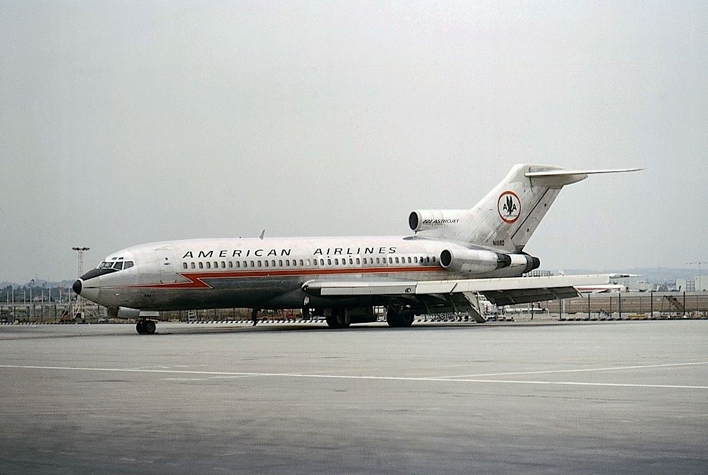 An American Airlines Boeing 727 on an airport apron.