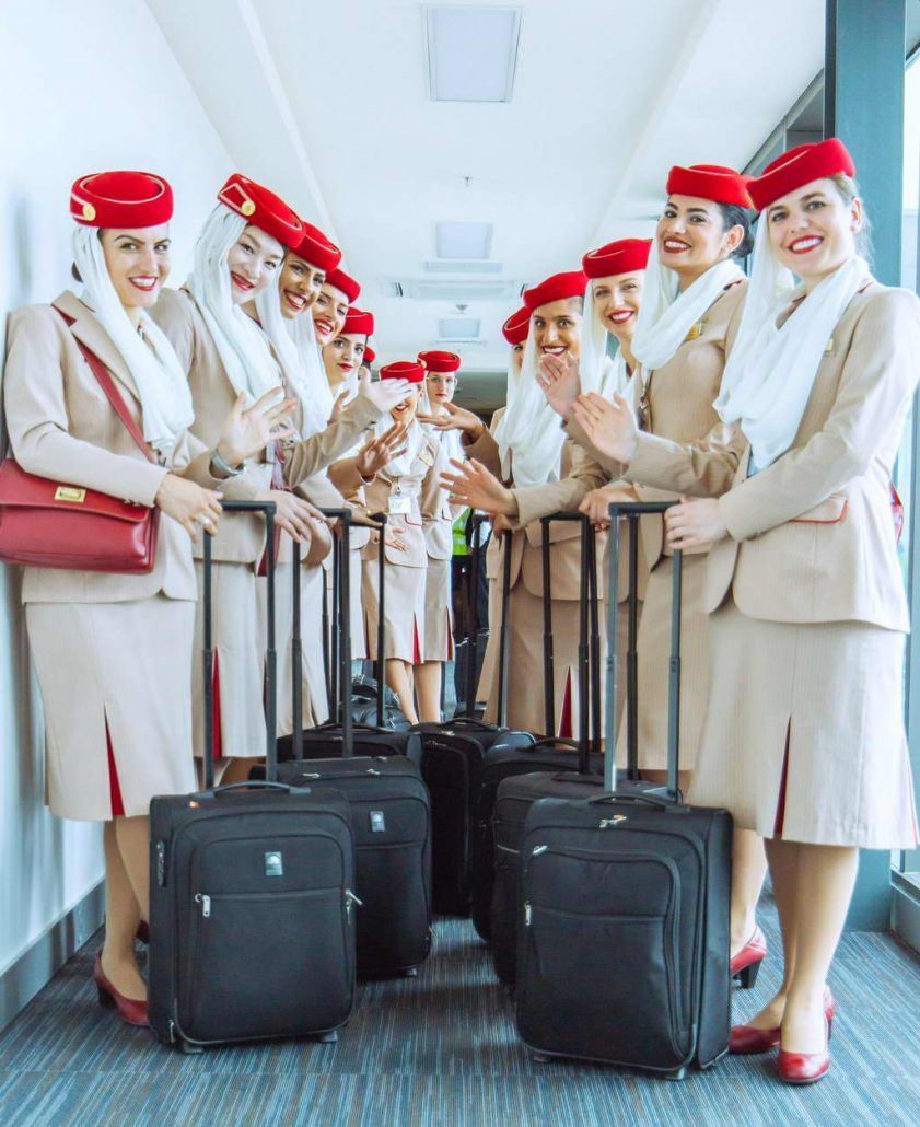 Emirates cabin crew with bags