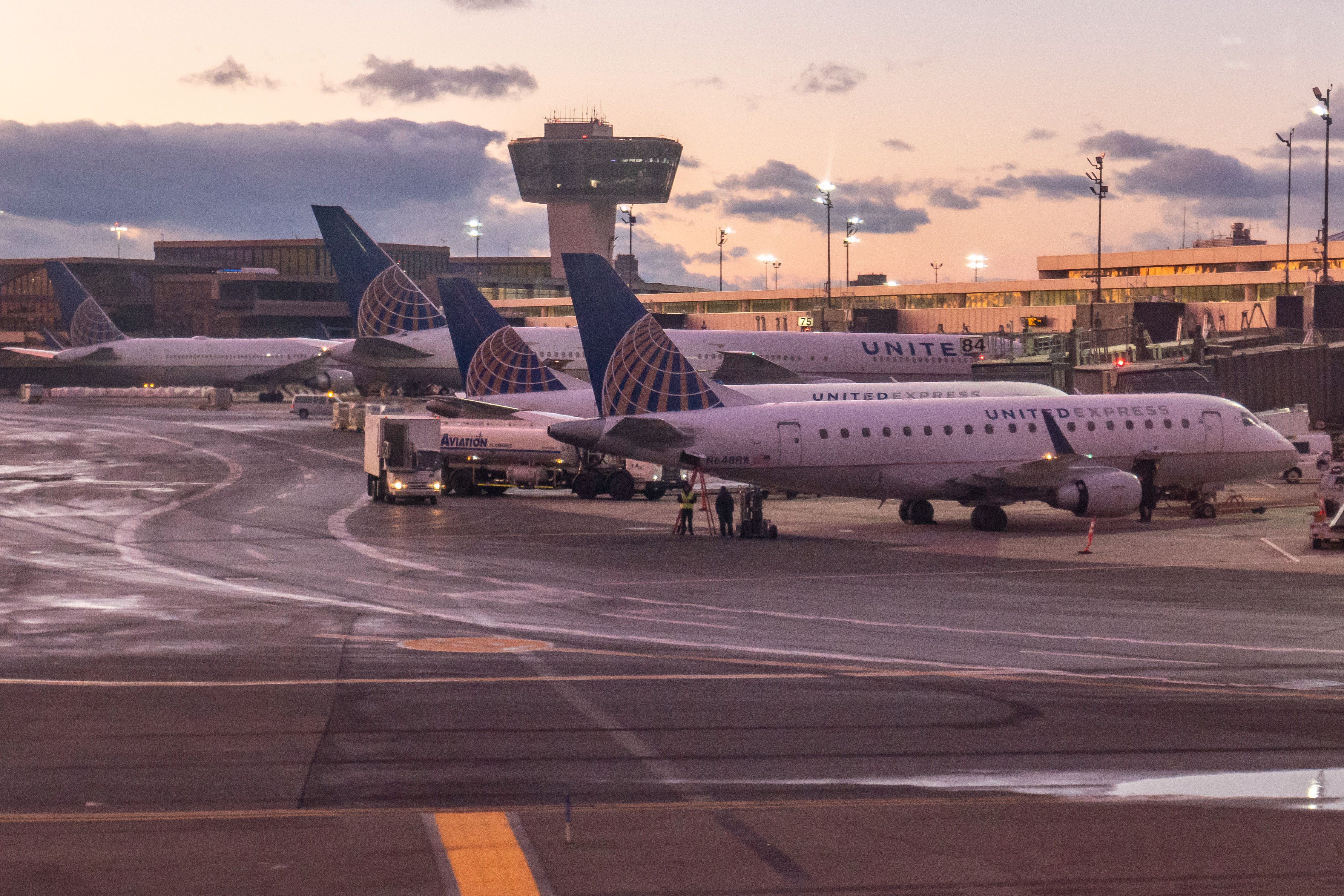 Batch of United Airlines Aircraft. General view of United Airlines airplanes during the sunset magic hour at Newark Liberty International Airport 