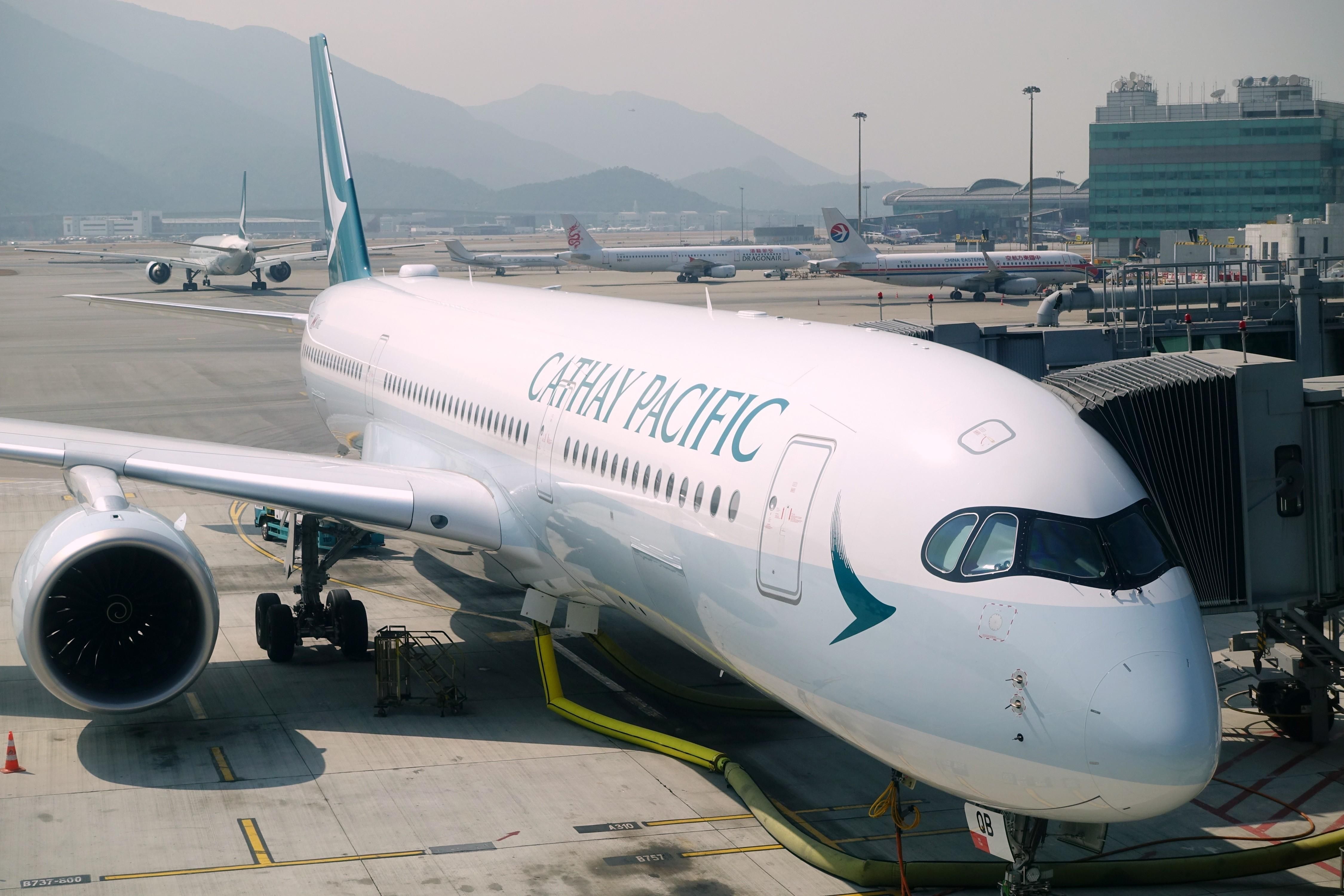 An airplane of Cathay Pacific Airways Limited stands at Hong Kong International Airport