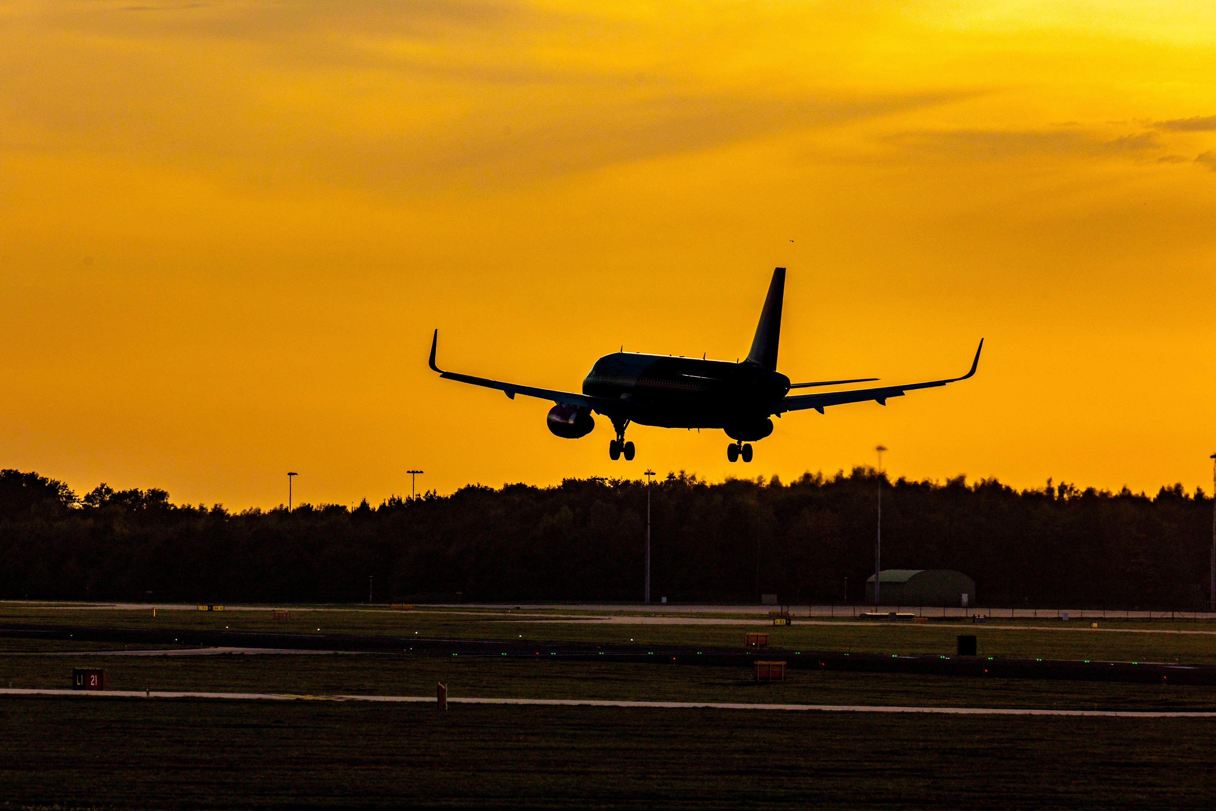 Airbus A320 Airplane Silhouette landing at airport