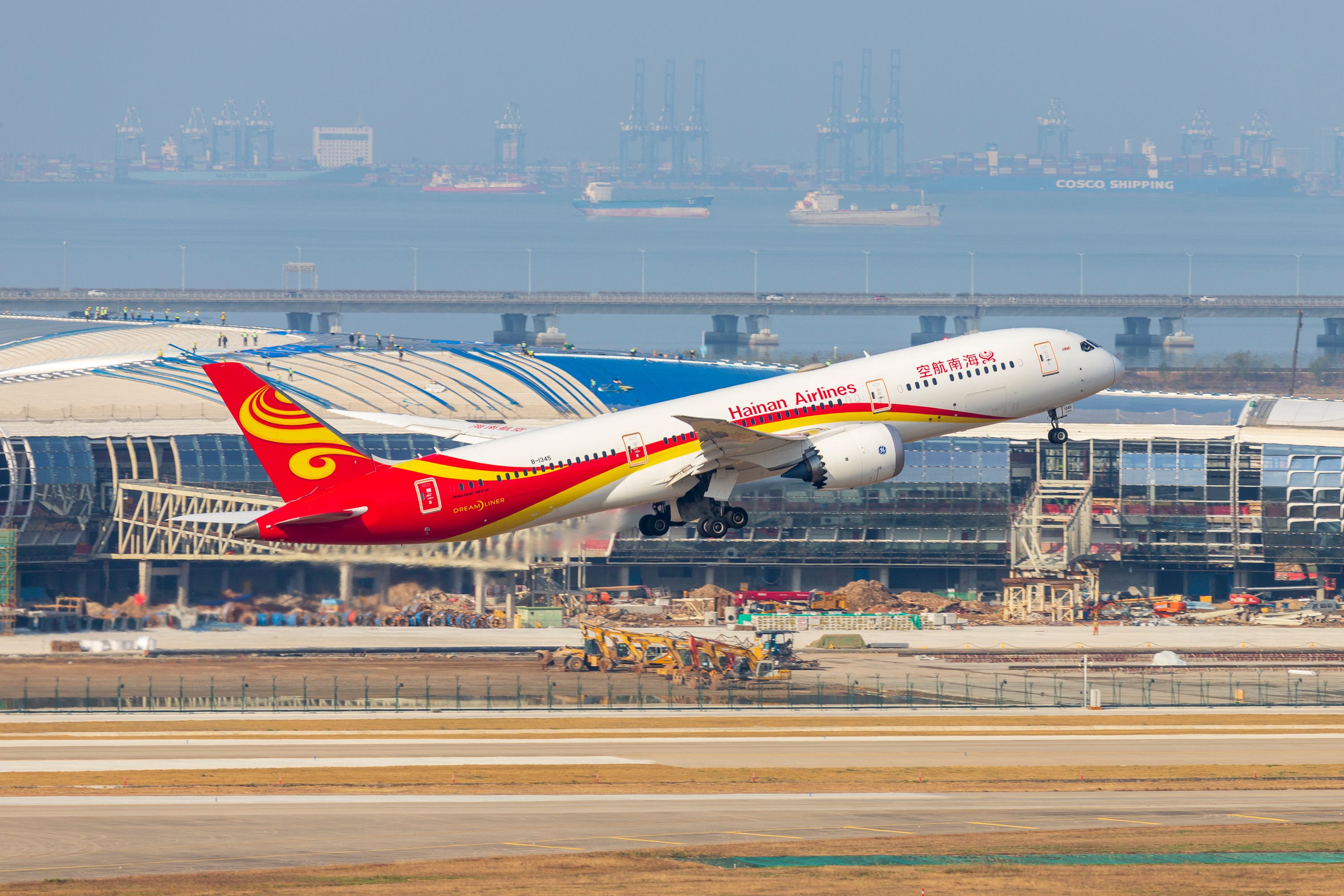 A Boeing 787-8 aircraft of Hainan Airlines takes off at Shenzhen Bao'an International Airport on the second day of the Chinese New Year, the Year of the Ox, on February 13, 2021 in Shenzhen, Guangdong Province of China.