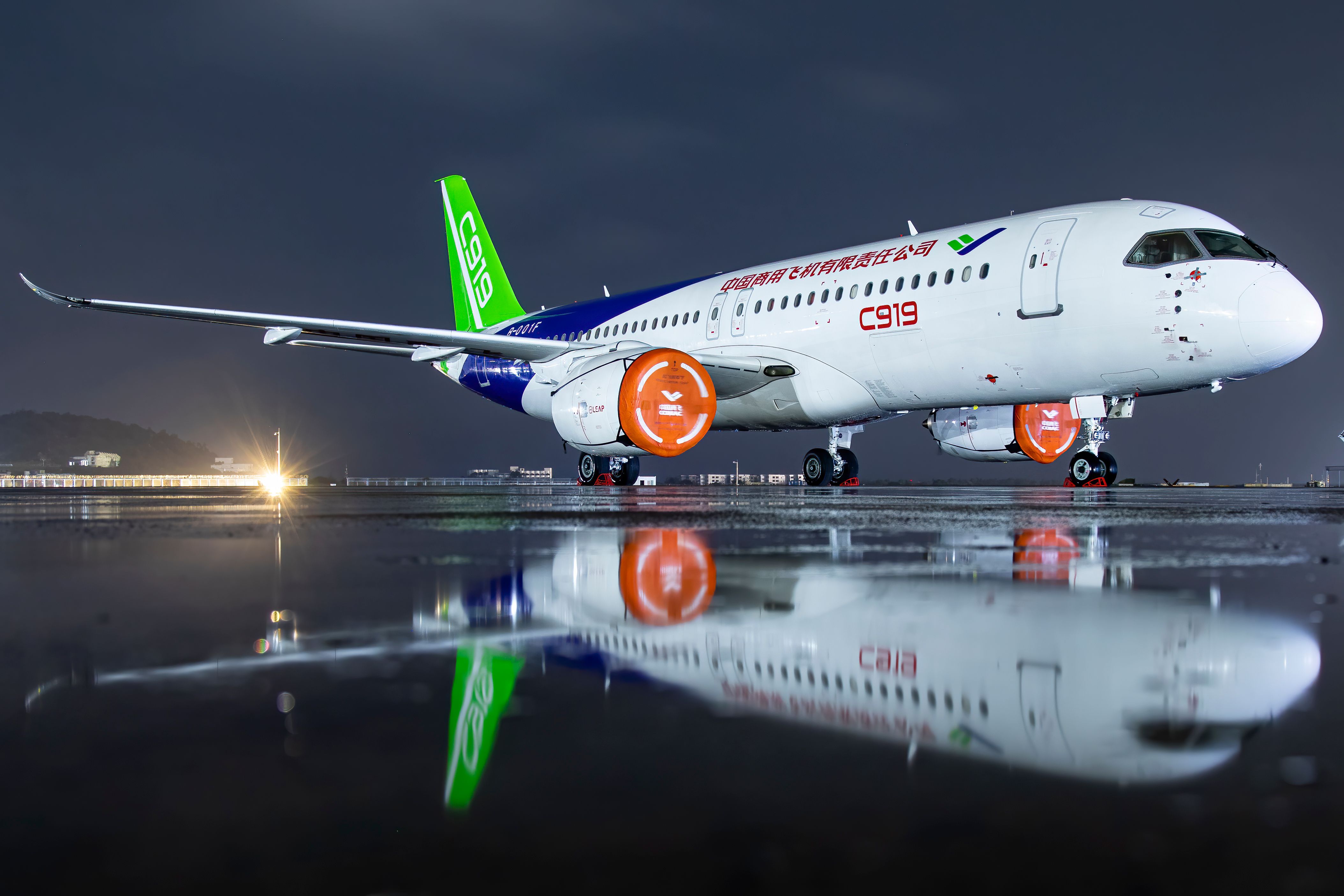 COMAC C919 aircraft on apron in the dark