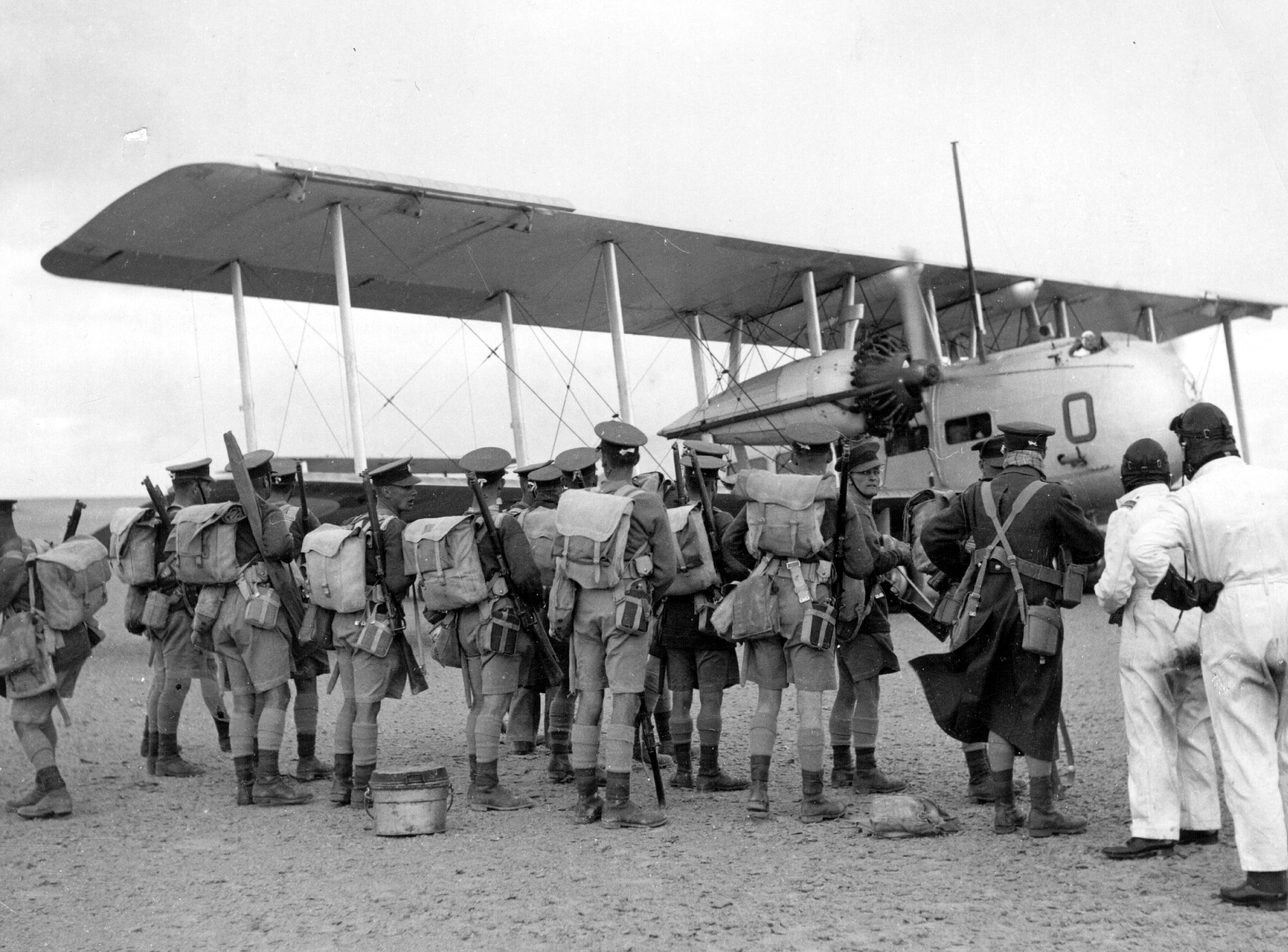 Troops in front of Vickers aircraft