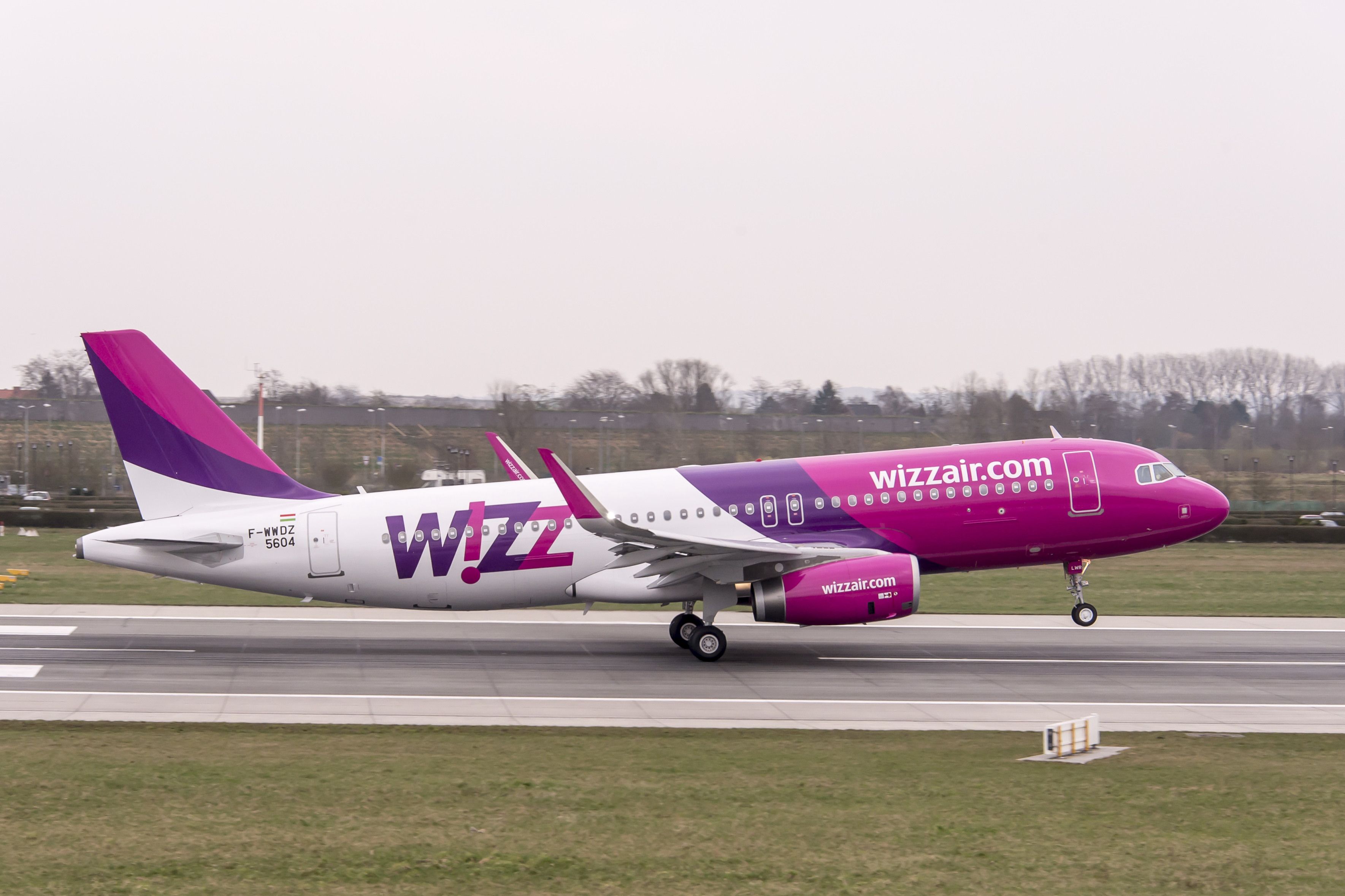 A Wizz Air Airbus A320 taking off.