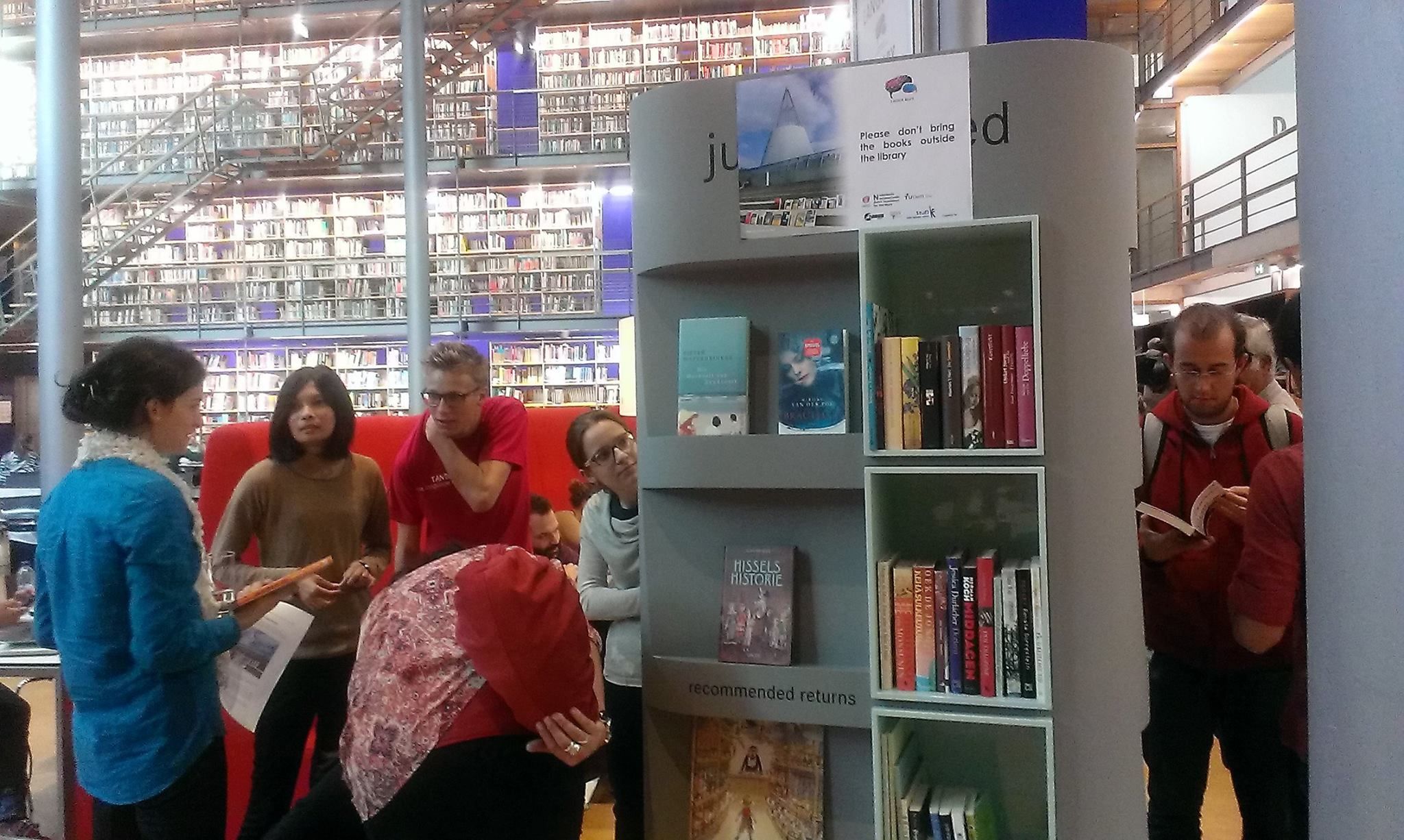 Students touring the airport library