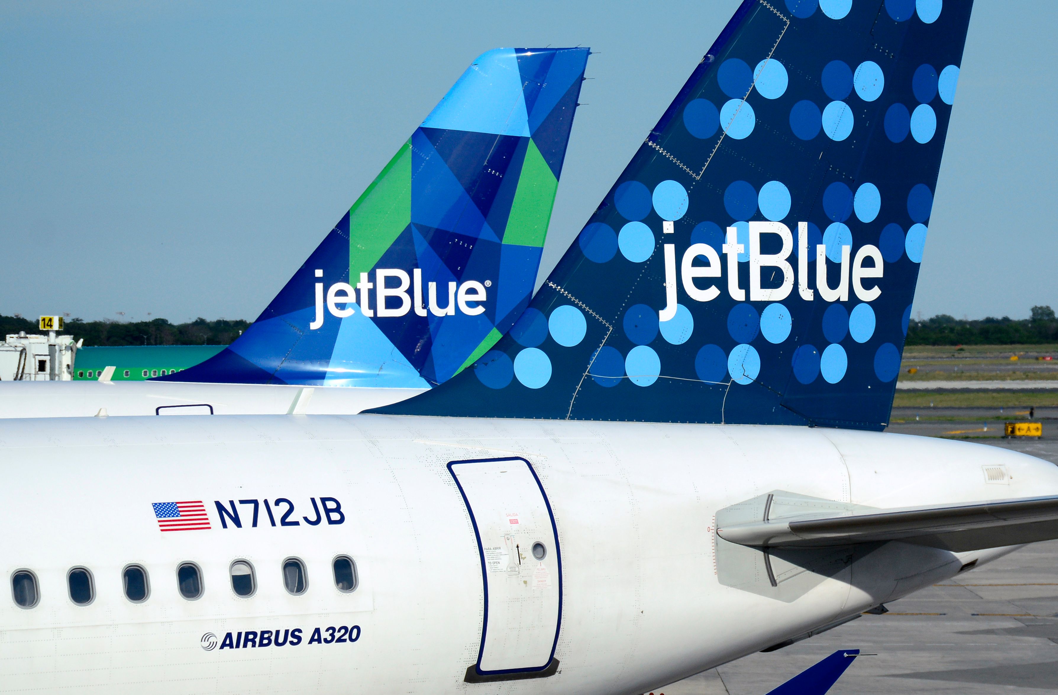 A pair of JetBlue Airways Airbus A320 passenger planes