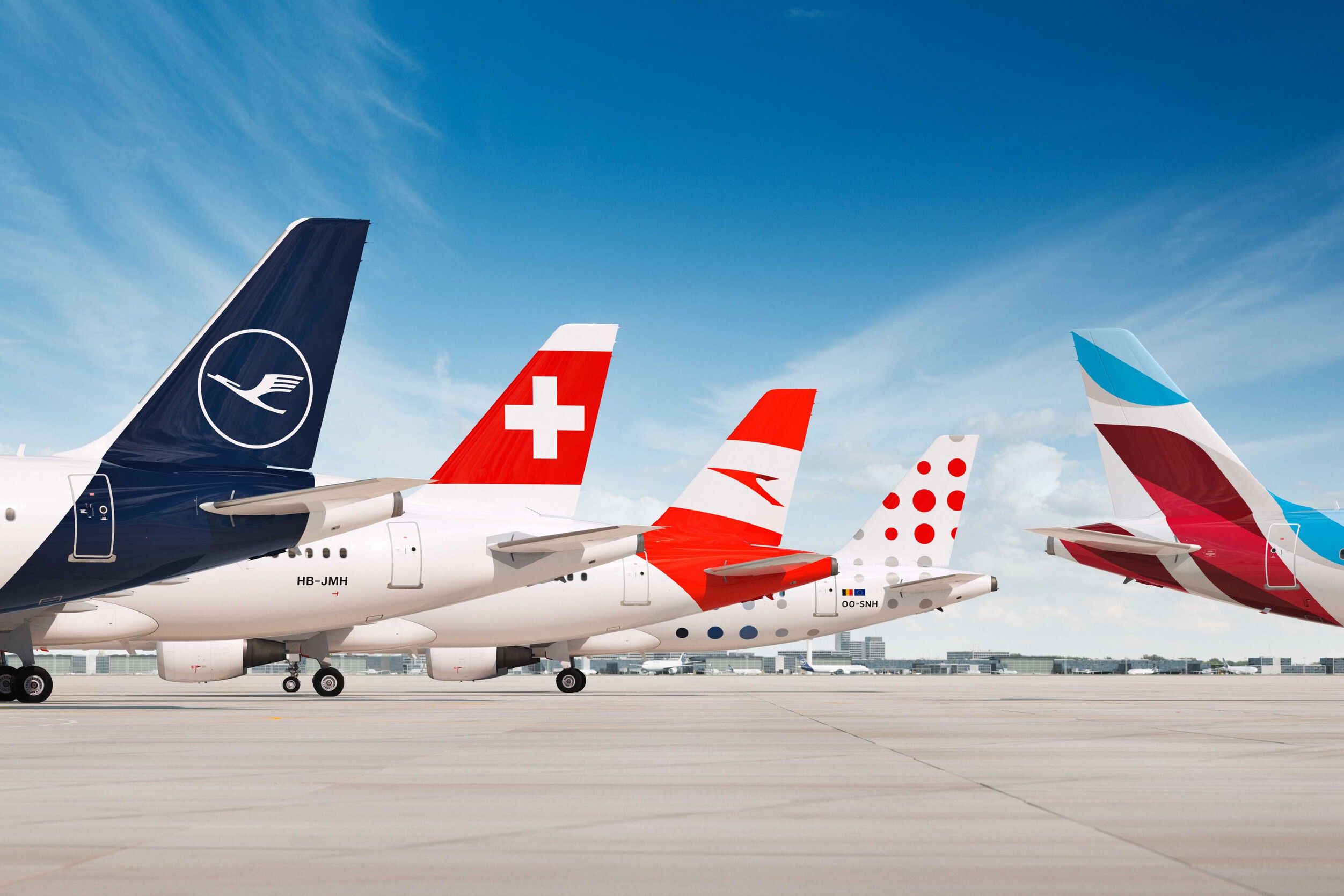Tails of Lufthansa Group airlines, including Lufthansa, SWISS, Austrian, Brussels, and Eurowings.
