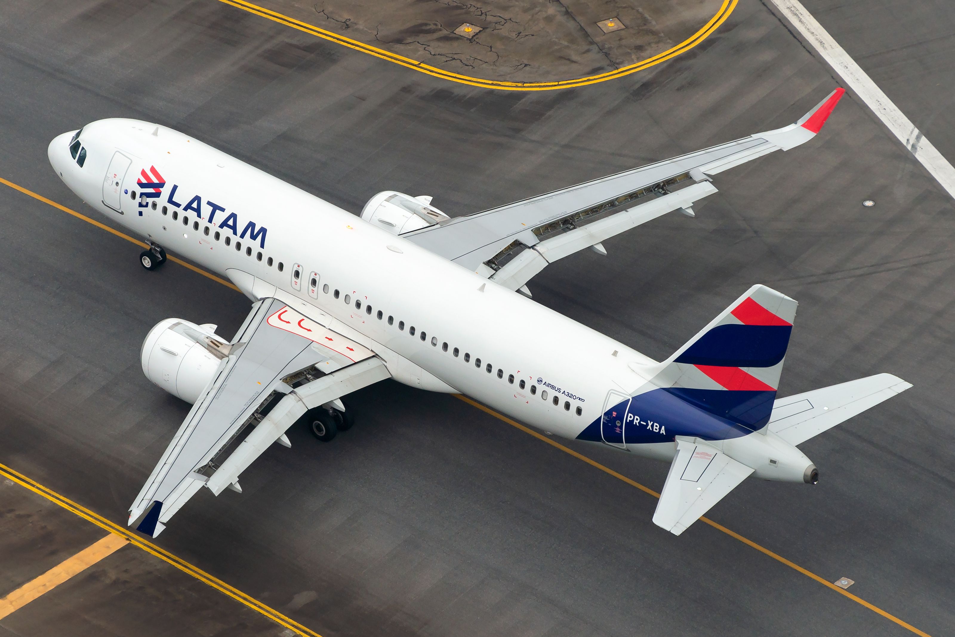 Aerial view of LATAM Airbus A320 NEO taxiing after arrival in Guarulhos Airport (GRU  SBGR). Narrowbody aircraft mostly used for domestic flights.-1