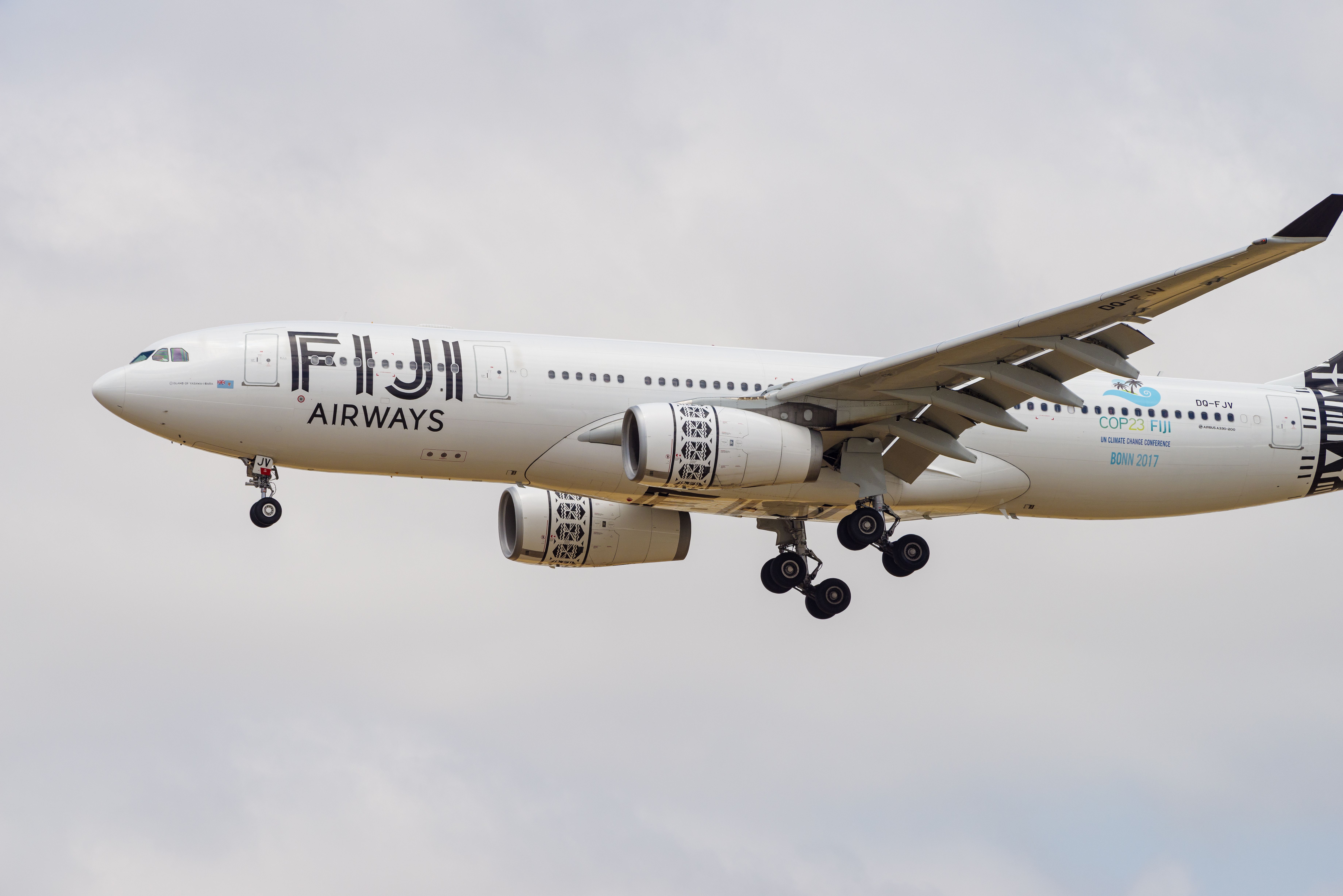Fiji Airways aircraft (Airbus A330-200) descending toward LAX for landing. Special 'COP23 FIJI un climate change conference Bonn 2017' livery.
