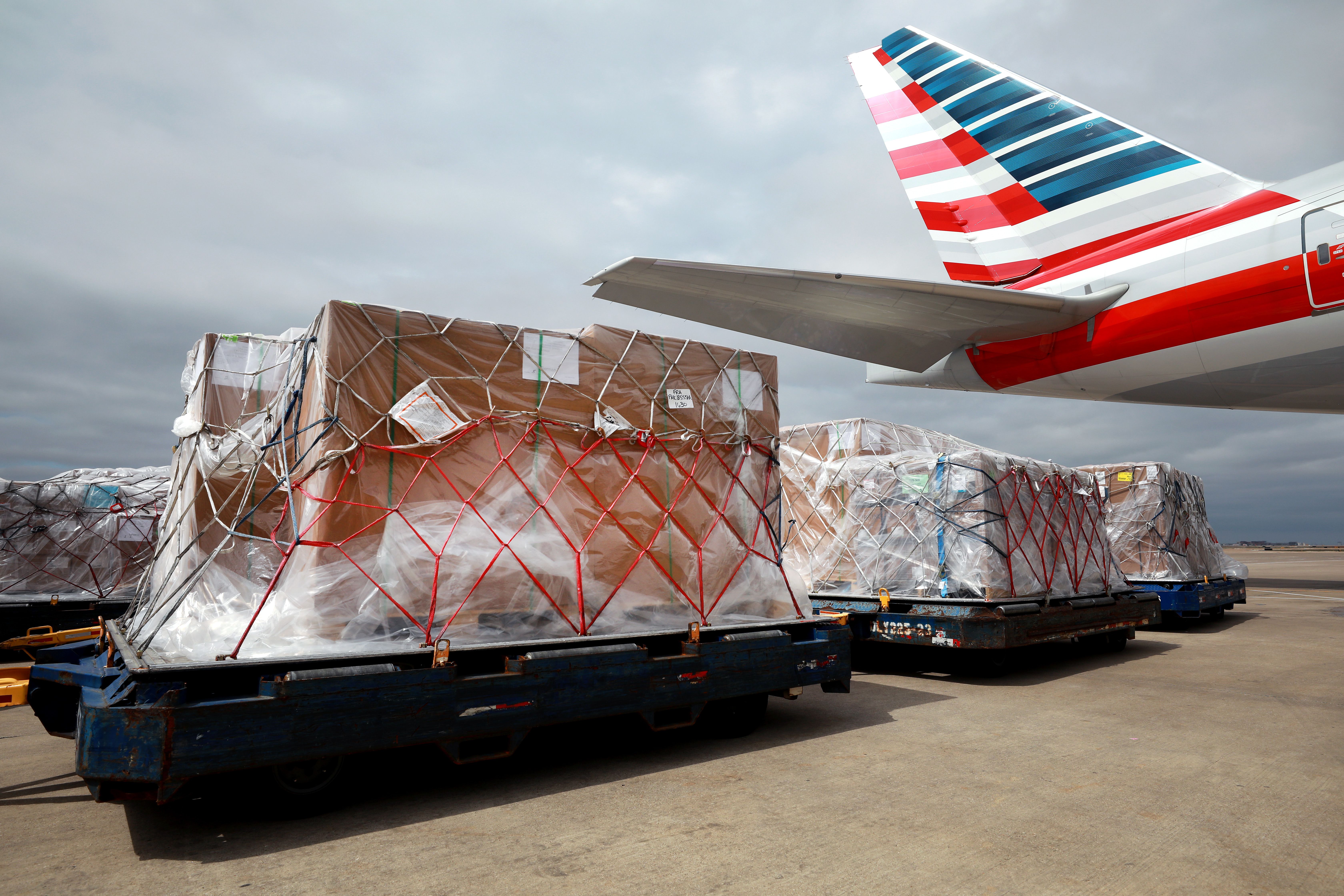 American Airlines cargo being loaded onto plane