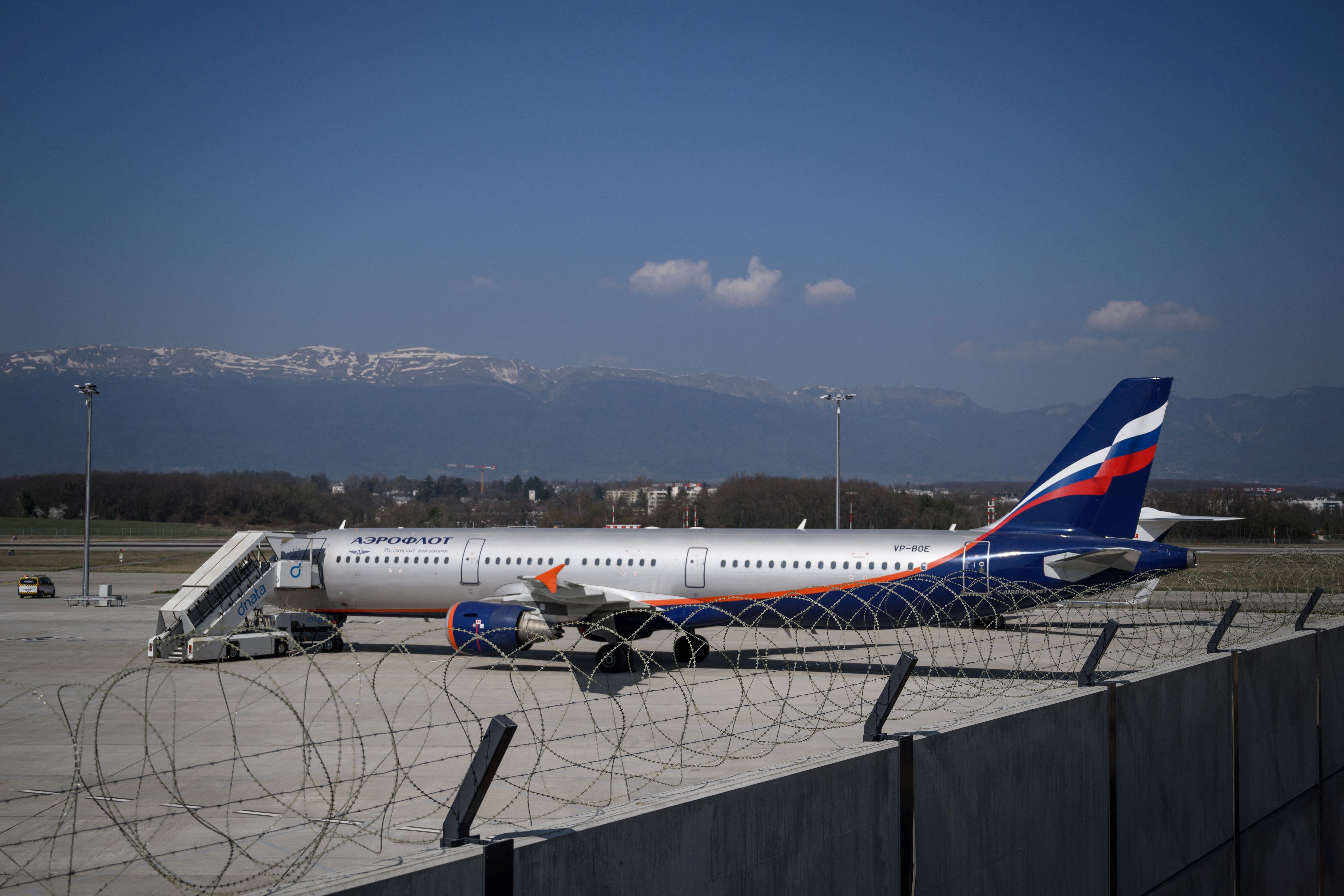 An Airbus A321-211 aircraft of Russian airline Aeroflot with registration VP-BOE (R) is seen in the long term parking for planes of Geneva Airport on March 25, 2022.
