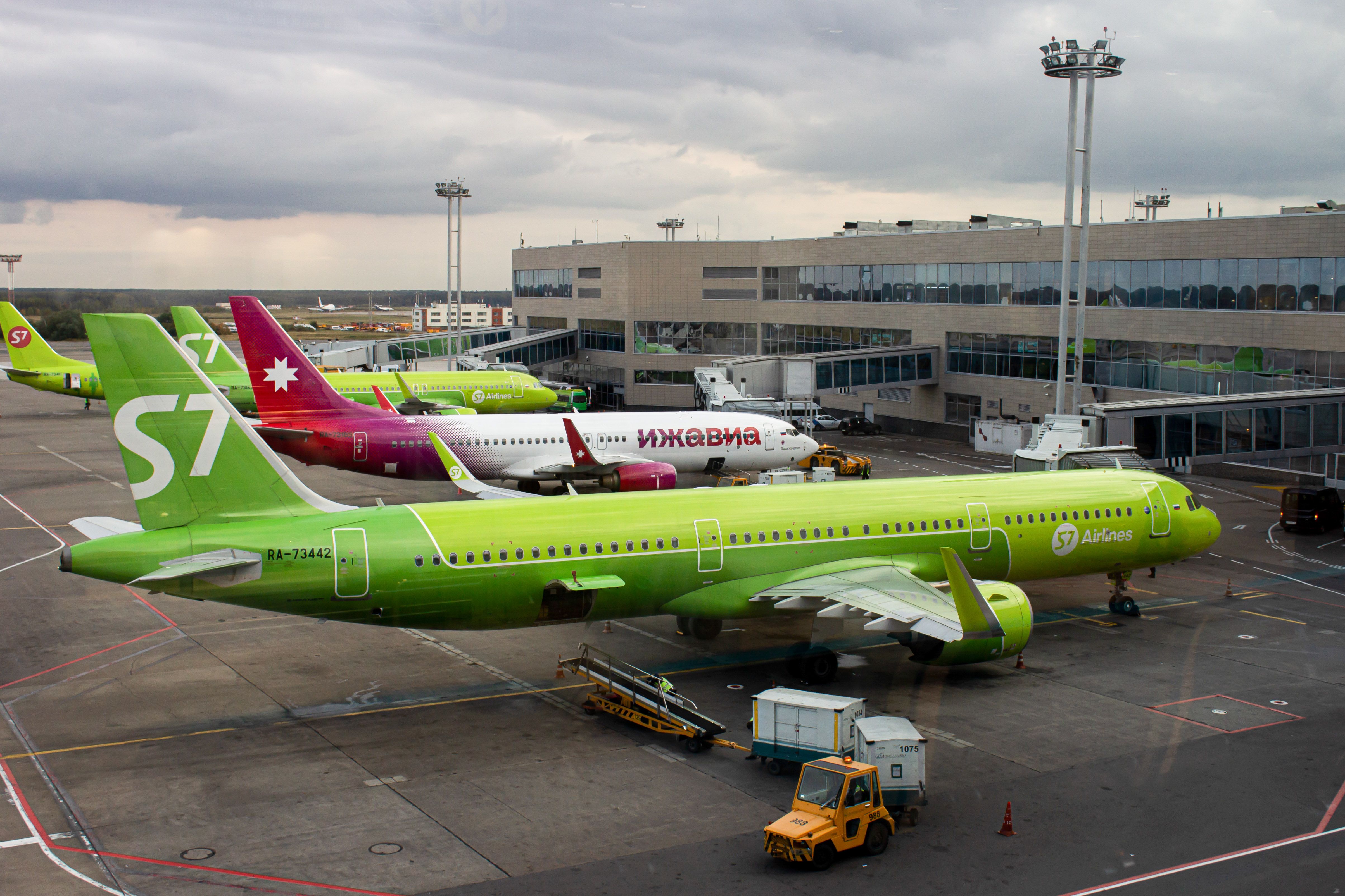 Aircraft from S7 Airlines and Izhavia Airlines are seen at the Domodedovo airport in Moscow