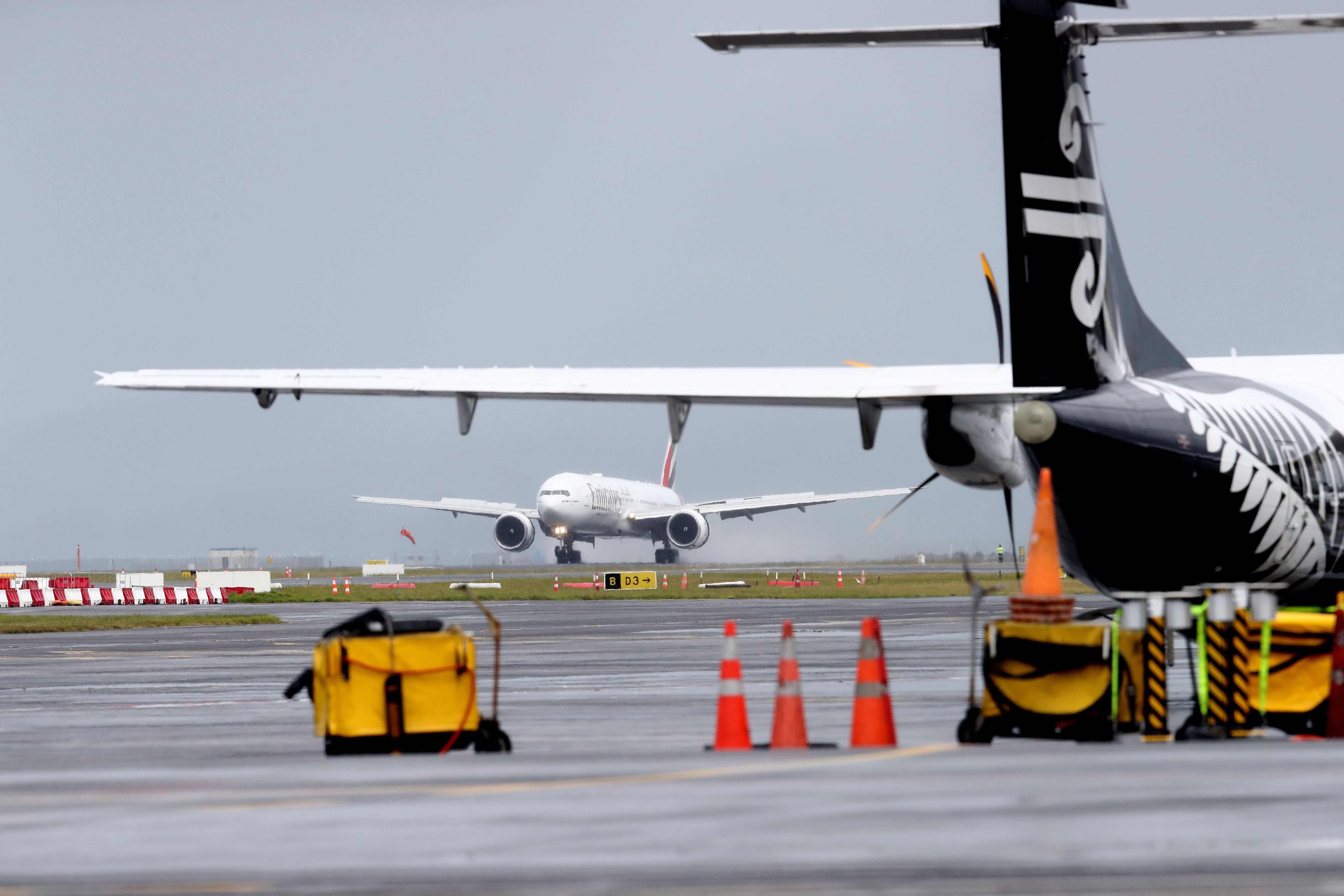 Air New Zealand Tail Emirates Boeing 777 Landing