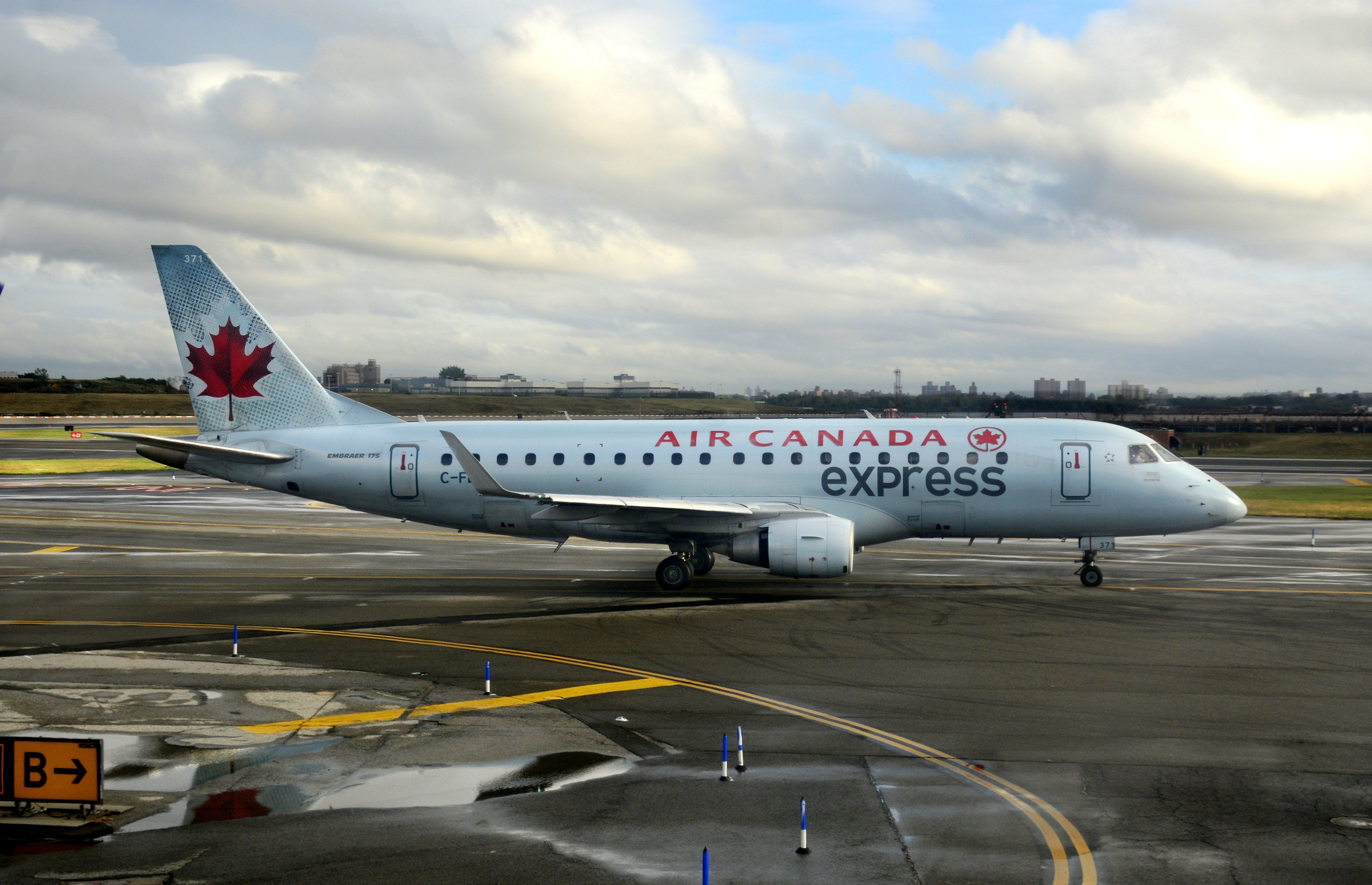 Air Canada Embraer E175 on ramp at New York Airport