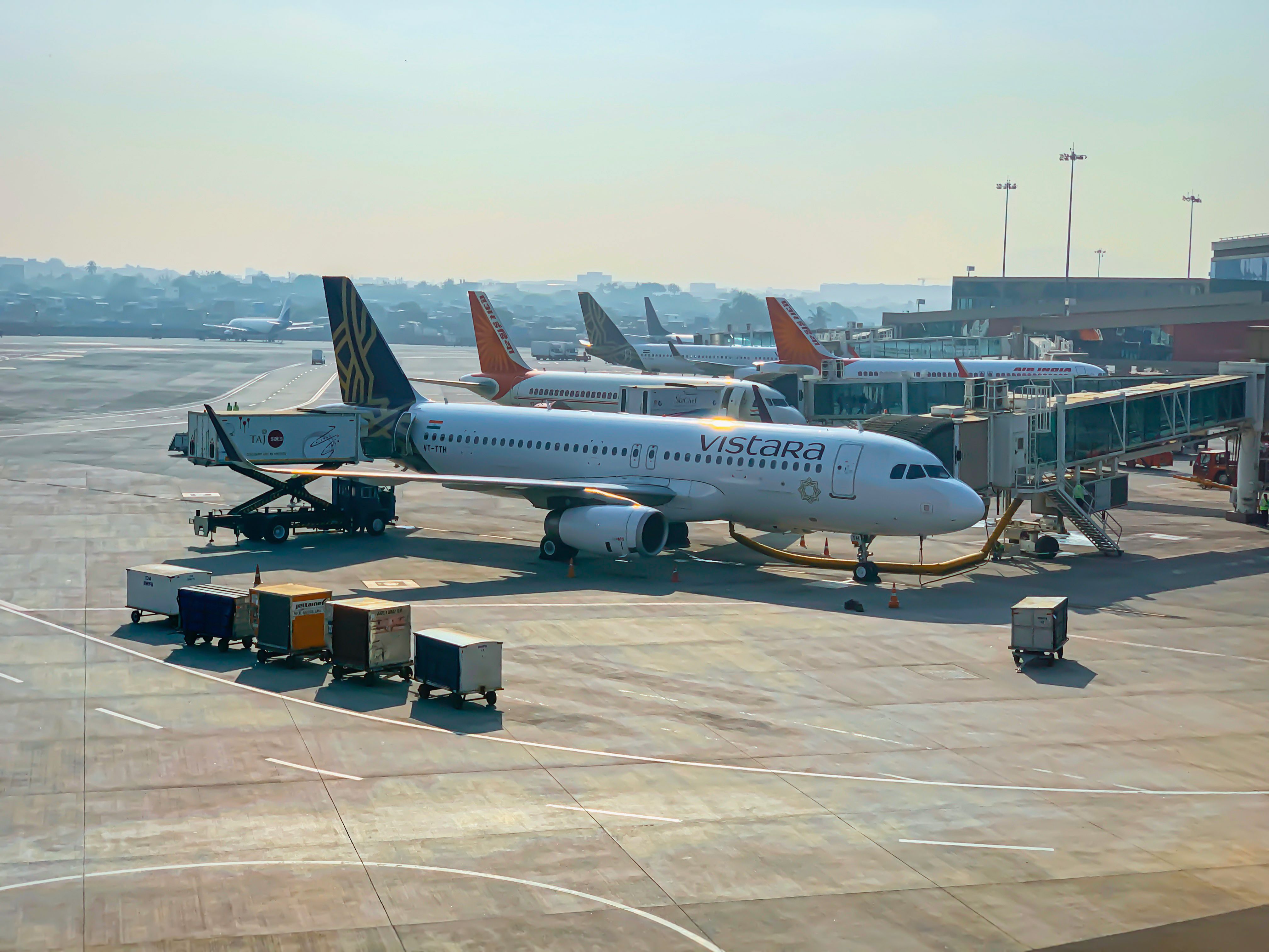 Air India and Vistara aircraft parked at Delhi Airport