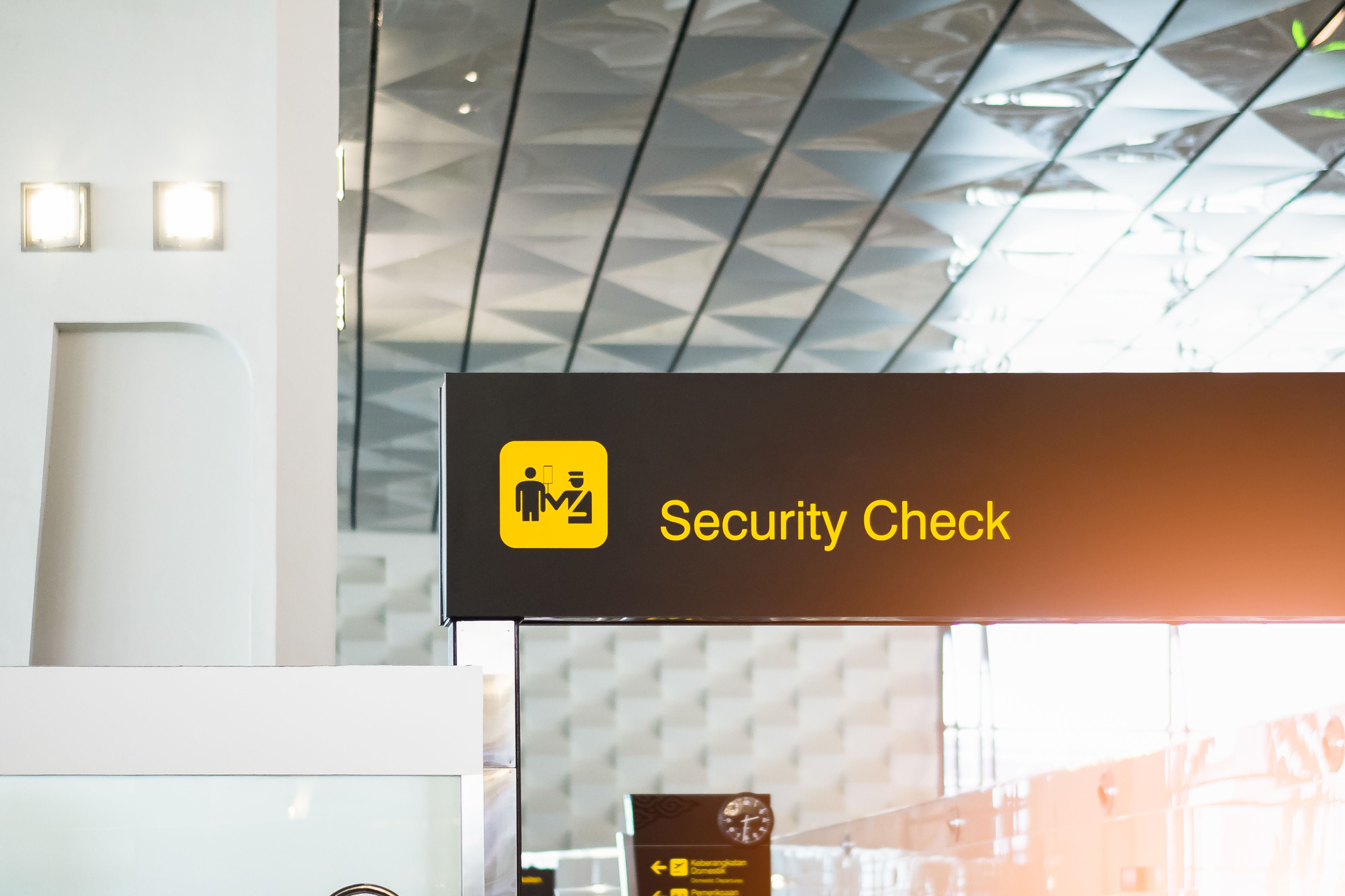 An airport Security Checkpoint sign.
