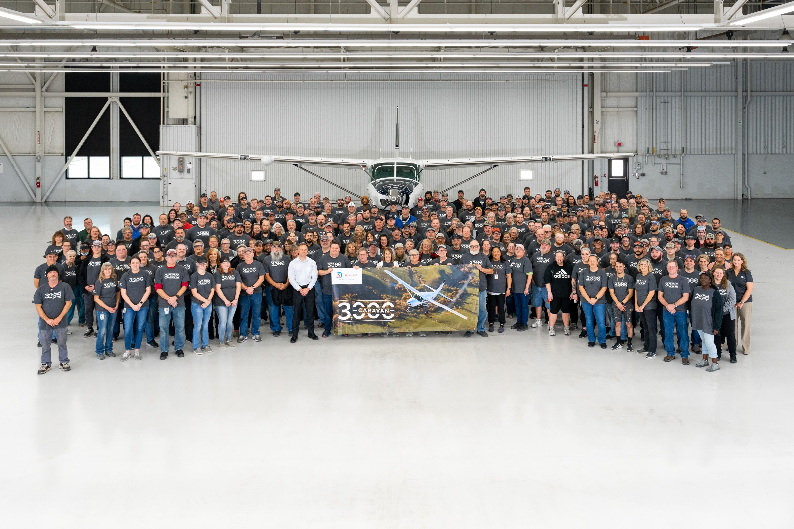 Textron Aviation employees at the Independence, Kansas, facility, celebrate the 3,000th Cessna Caravan