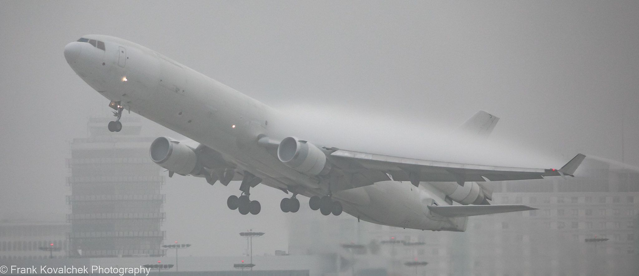 Western Global MD-11 Leaving LAX (in fog and creating vapes)