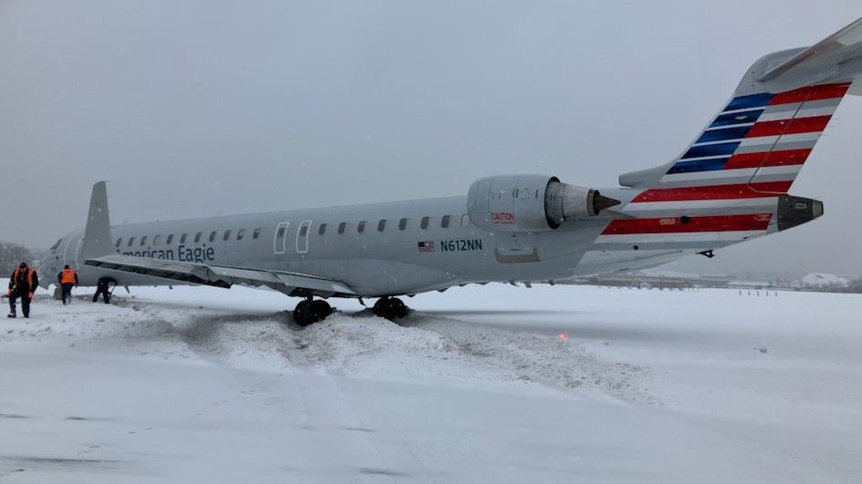 American Eagle Bombardier CRJ900 Slides Off Runway In Portland Maine