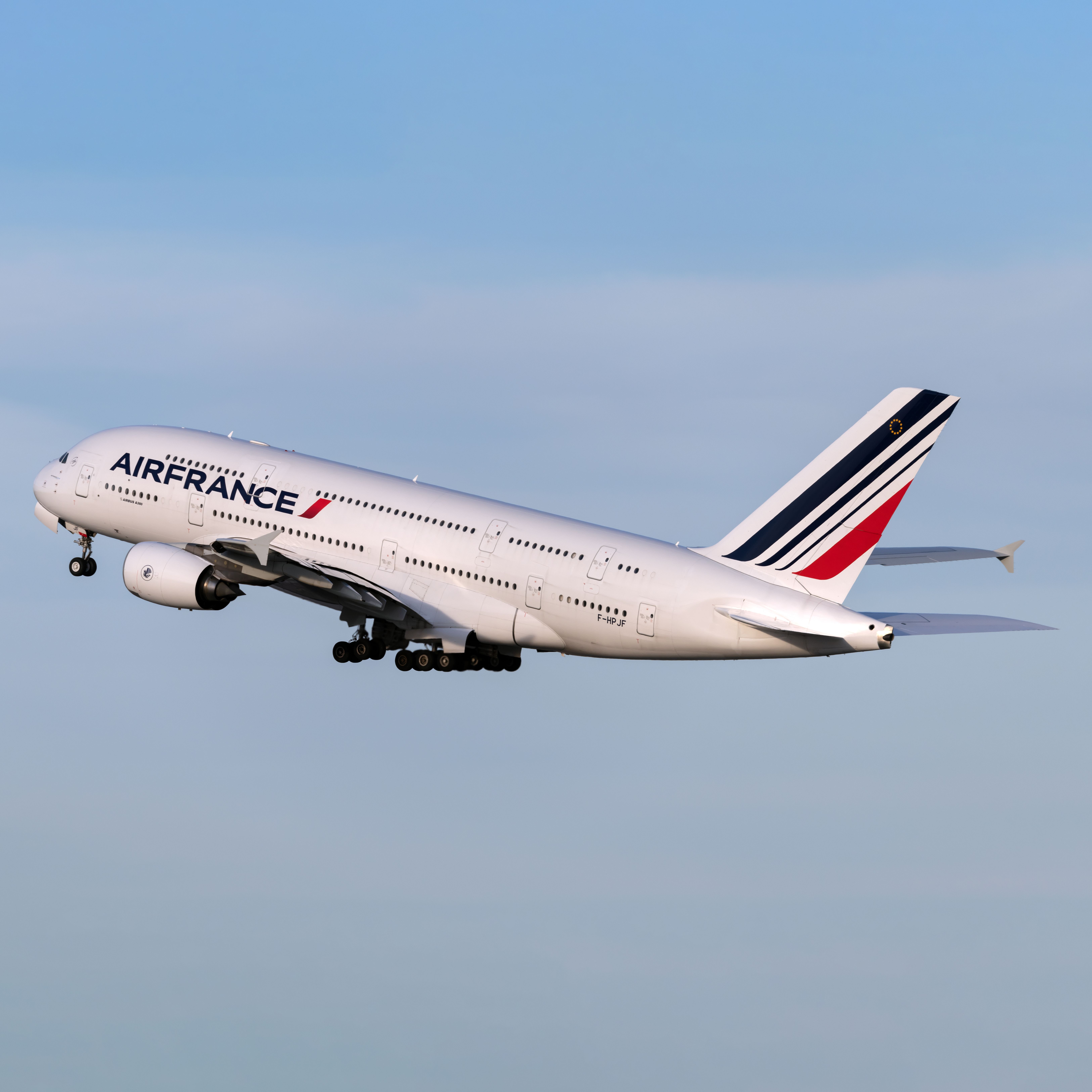 An Air France Airbus A380 in the first climb segment after departing from John F. Kennedy Airport in New York.