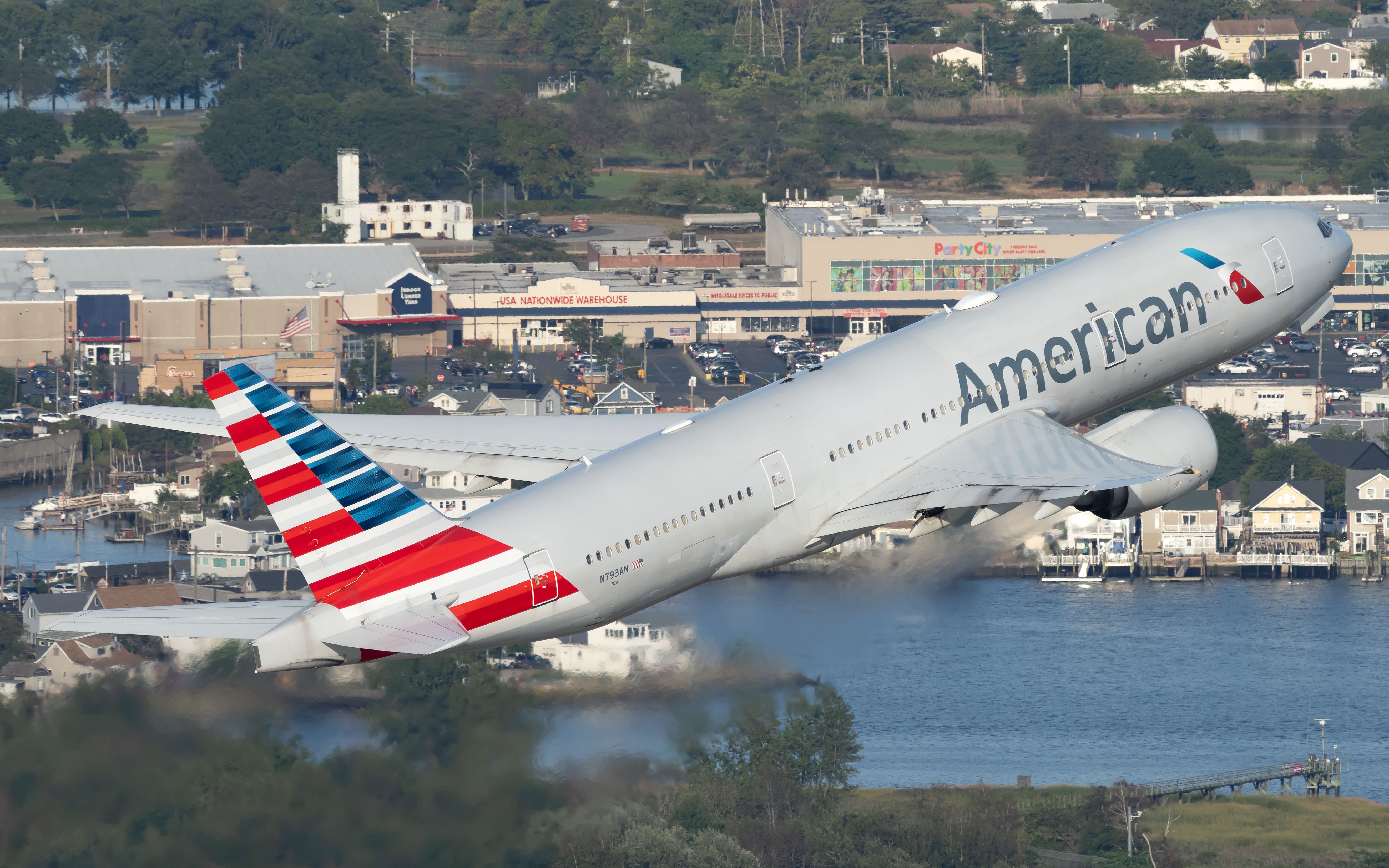 An American Airlines Boeing 777 taking off.