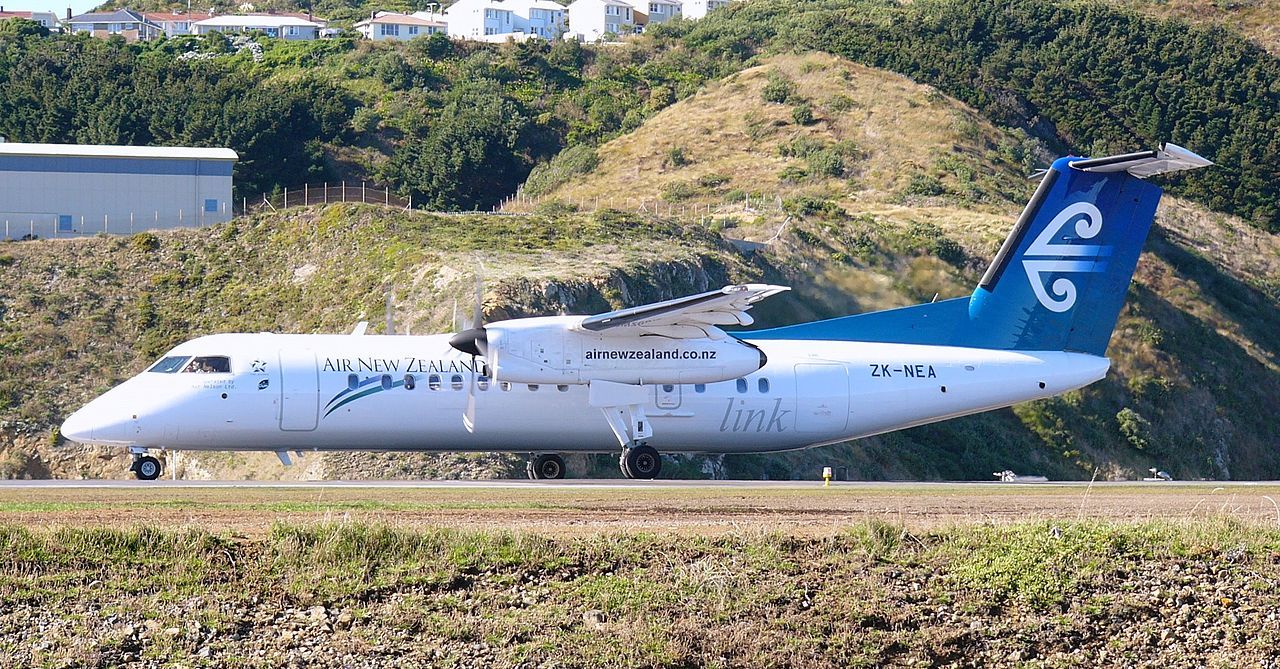 A De Havilland Canada DHC-8-300 of Air New Zealand Link rolling down the runway.