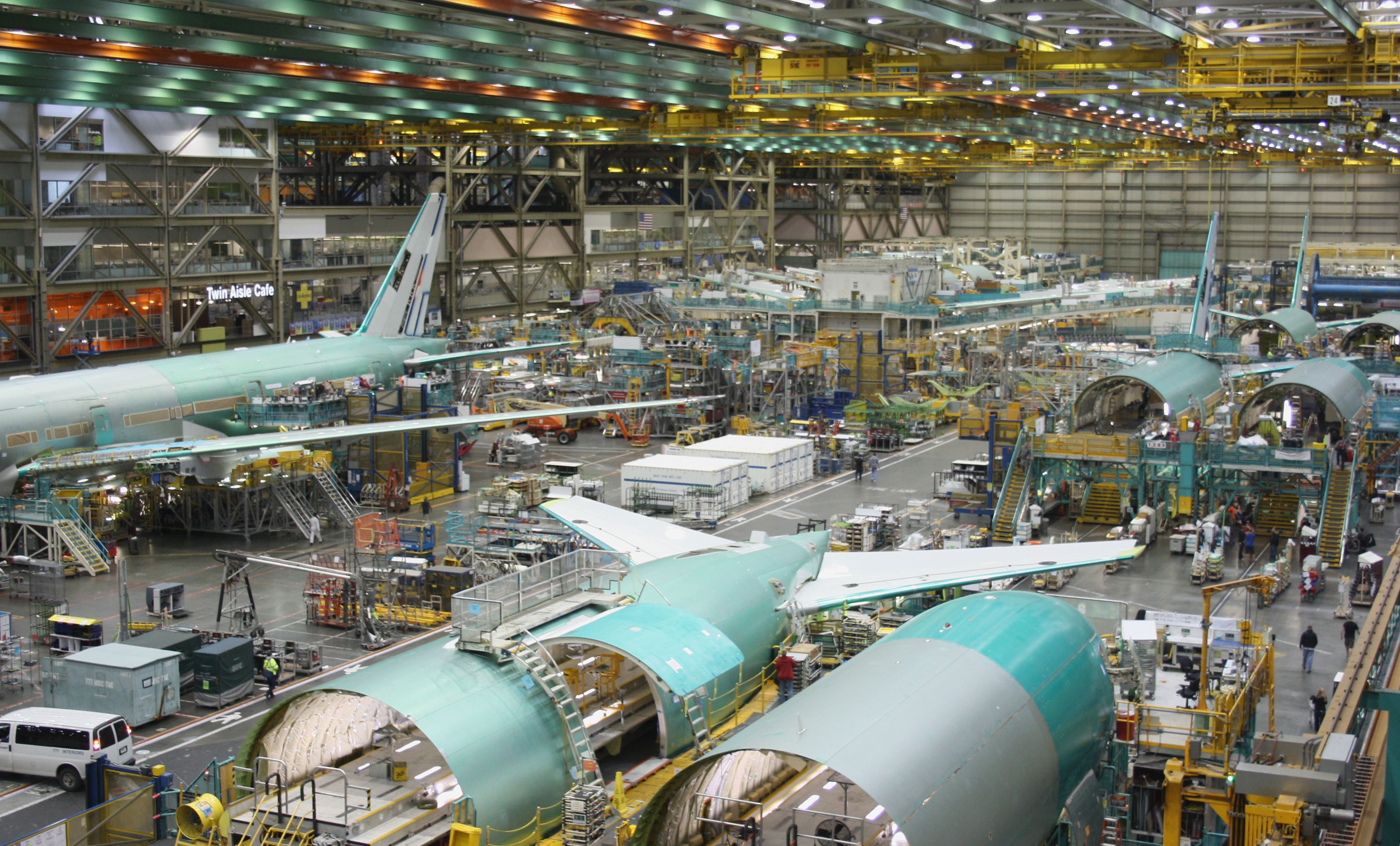 EVERETT (WA), USA – JANUARY 30 2015 Unidentified Boeing employees continue work building its latest Boeing 777 jets