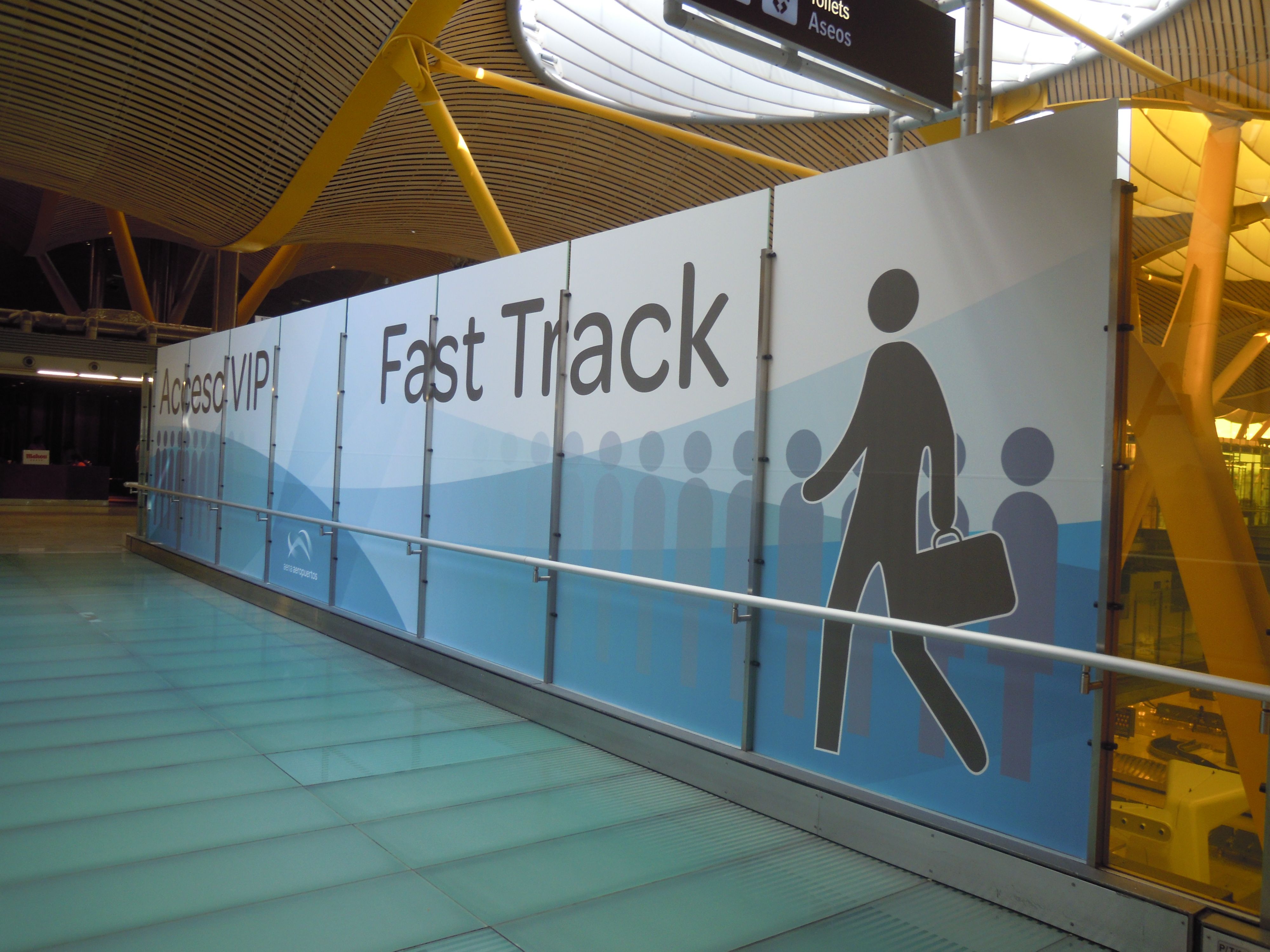 An airport security fast track sign.