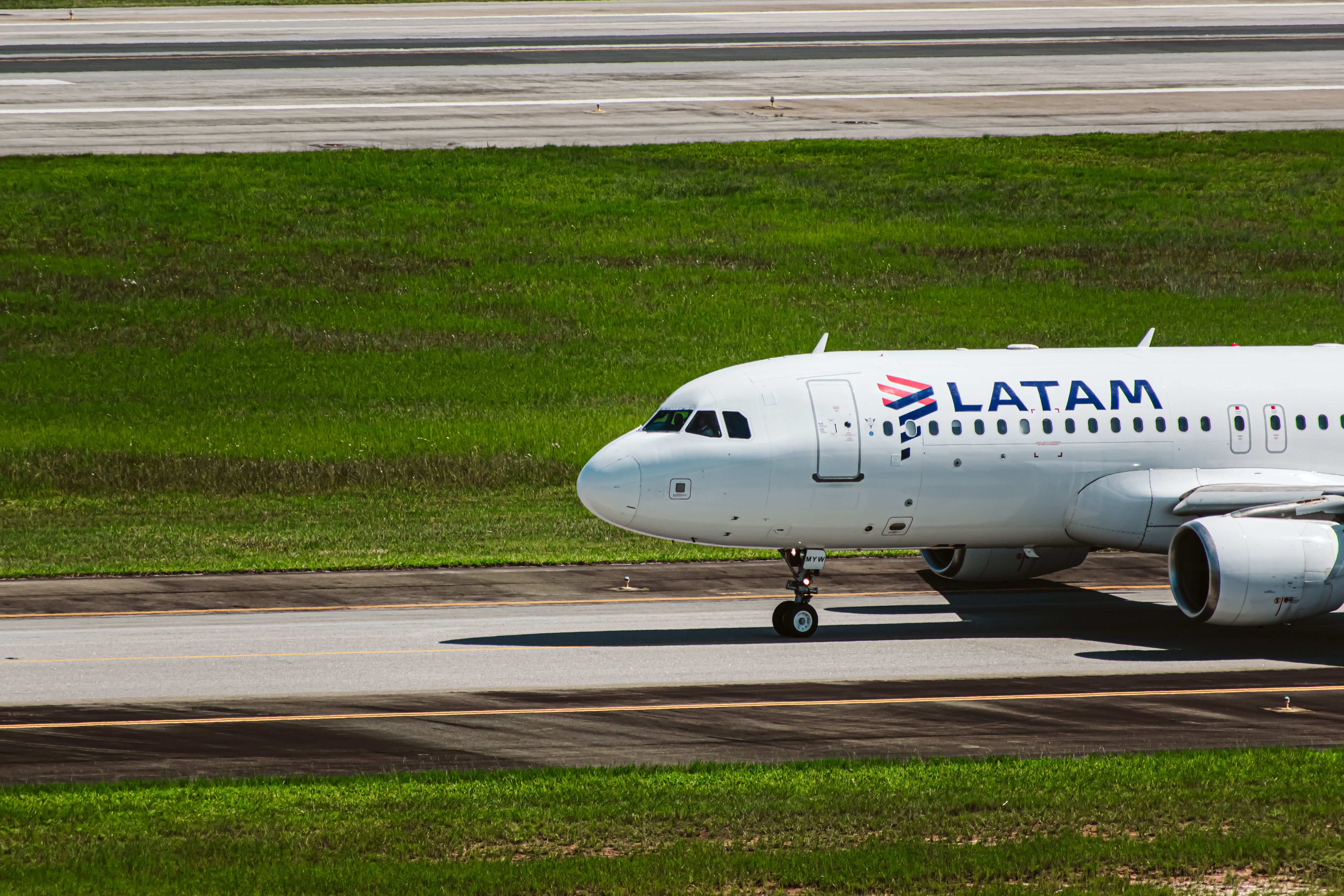 A LATAM Airbus A320 aircraft taxiing. 