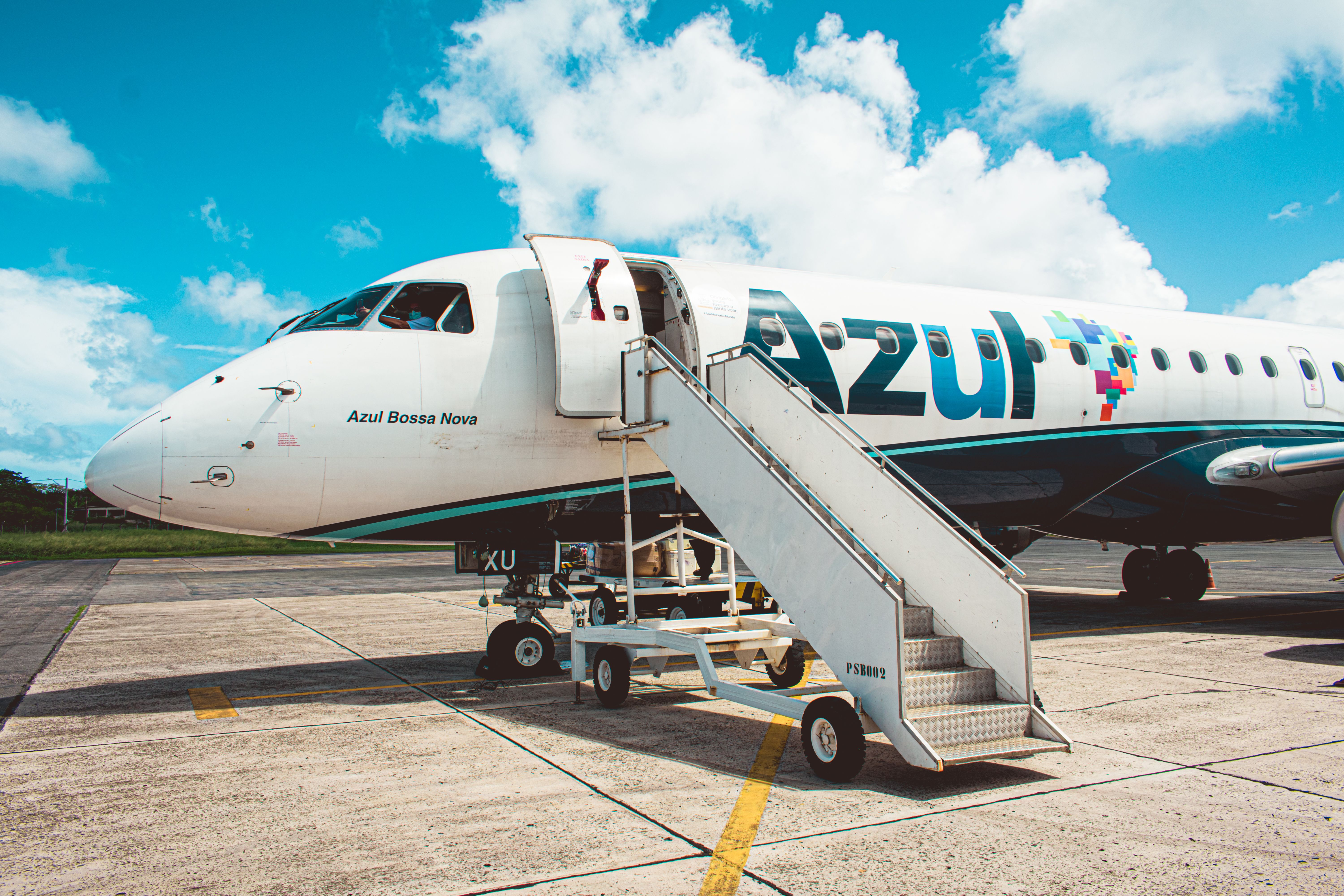 An Azul Embraer aircraft parked.