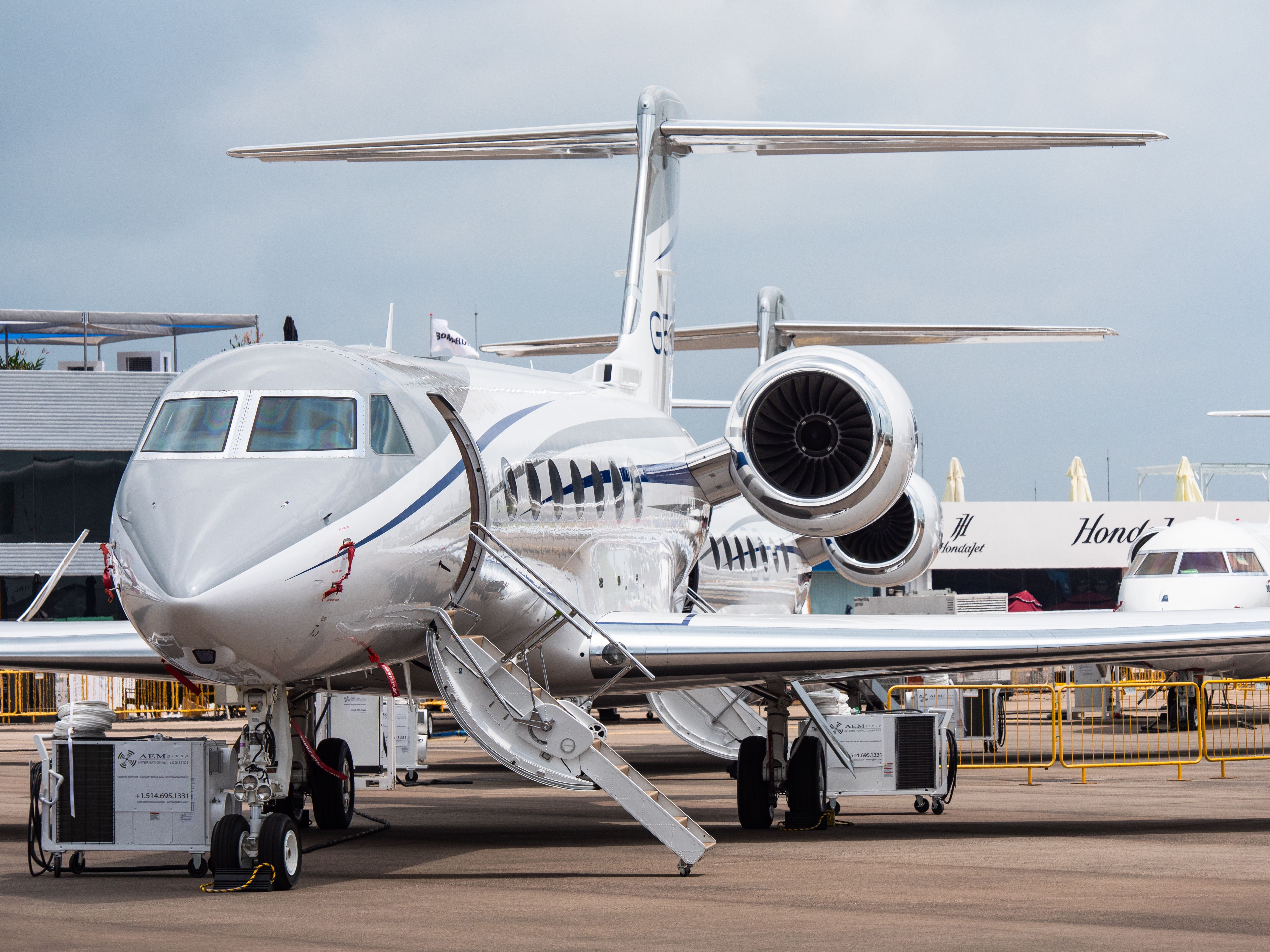 A Gulstream G550 parked at an airport.