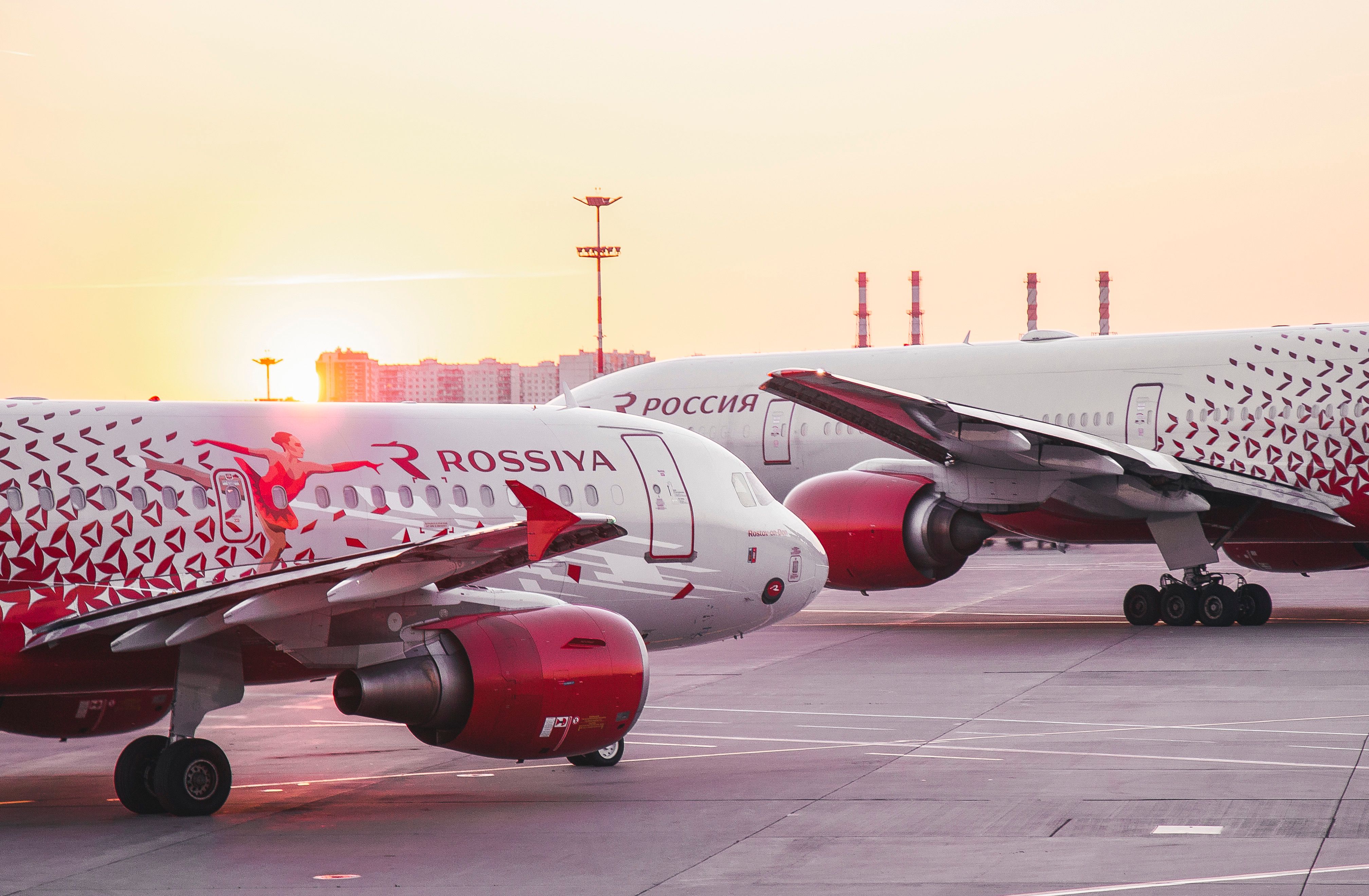Rossiya Airlines aircraft on ground a sunset