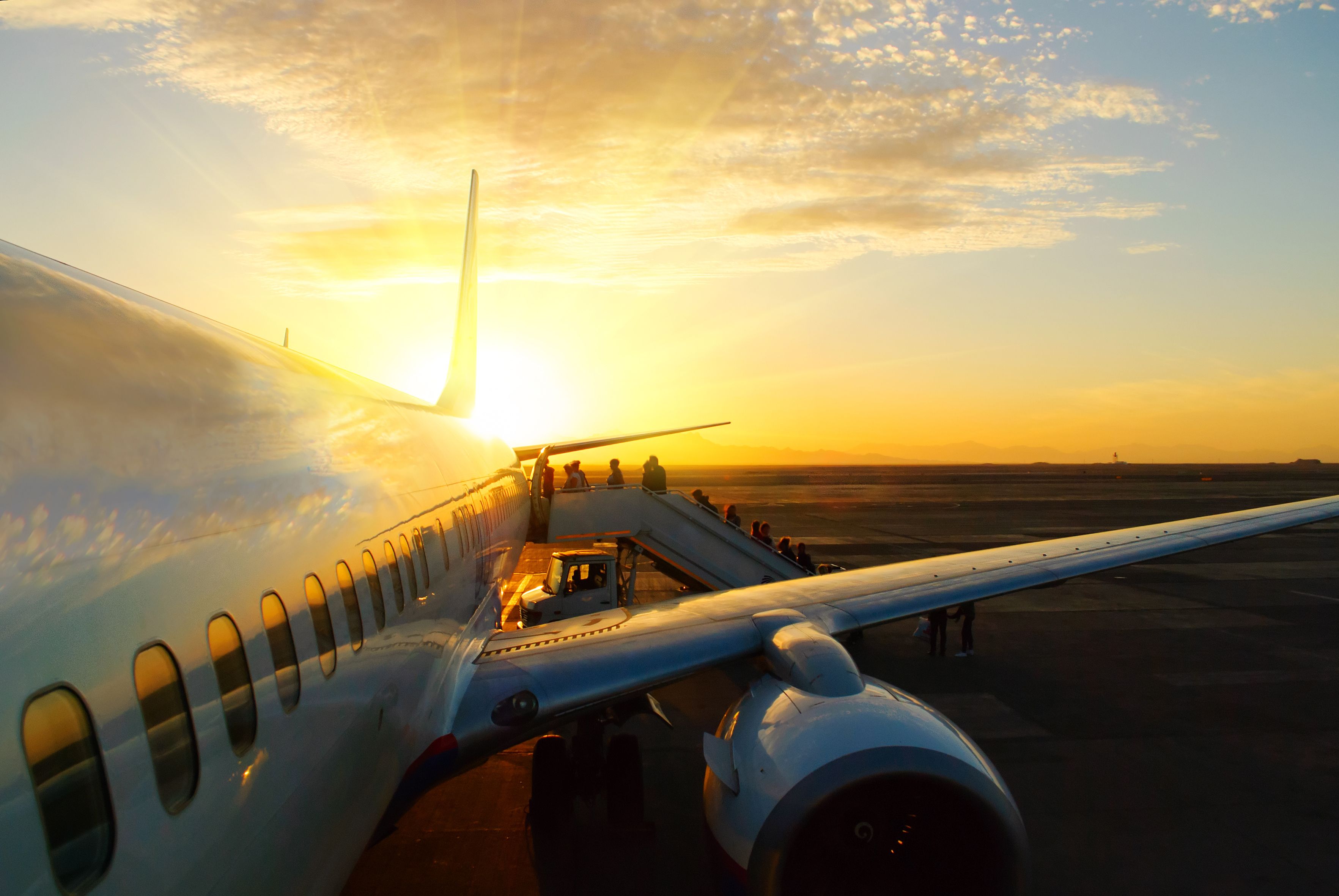 Aircraft Boarding Sunset